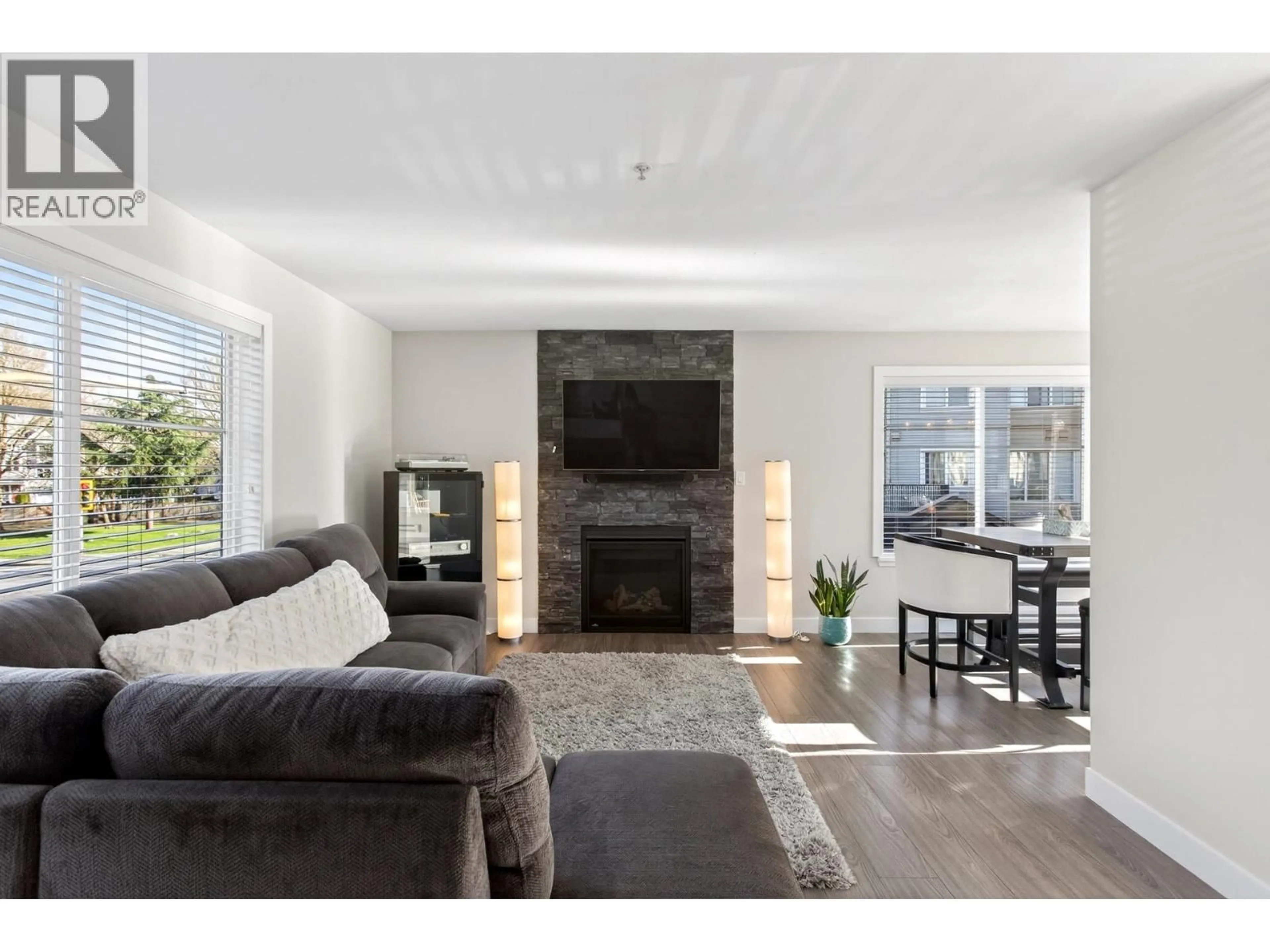 Living room with furniture, unknown for 20 - 2488 PITT RIVER ROAD, Port Coquitlam British Columbia V3C1R9