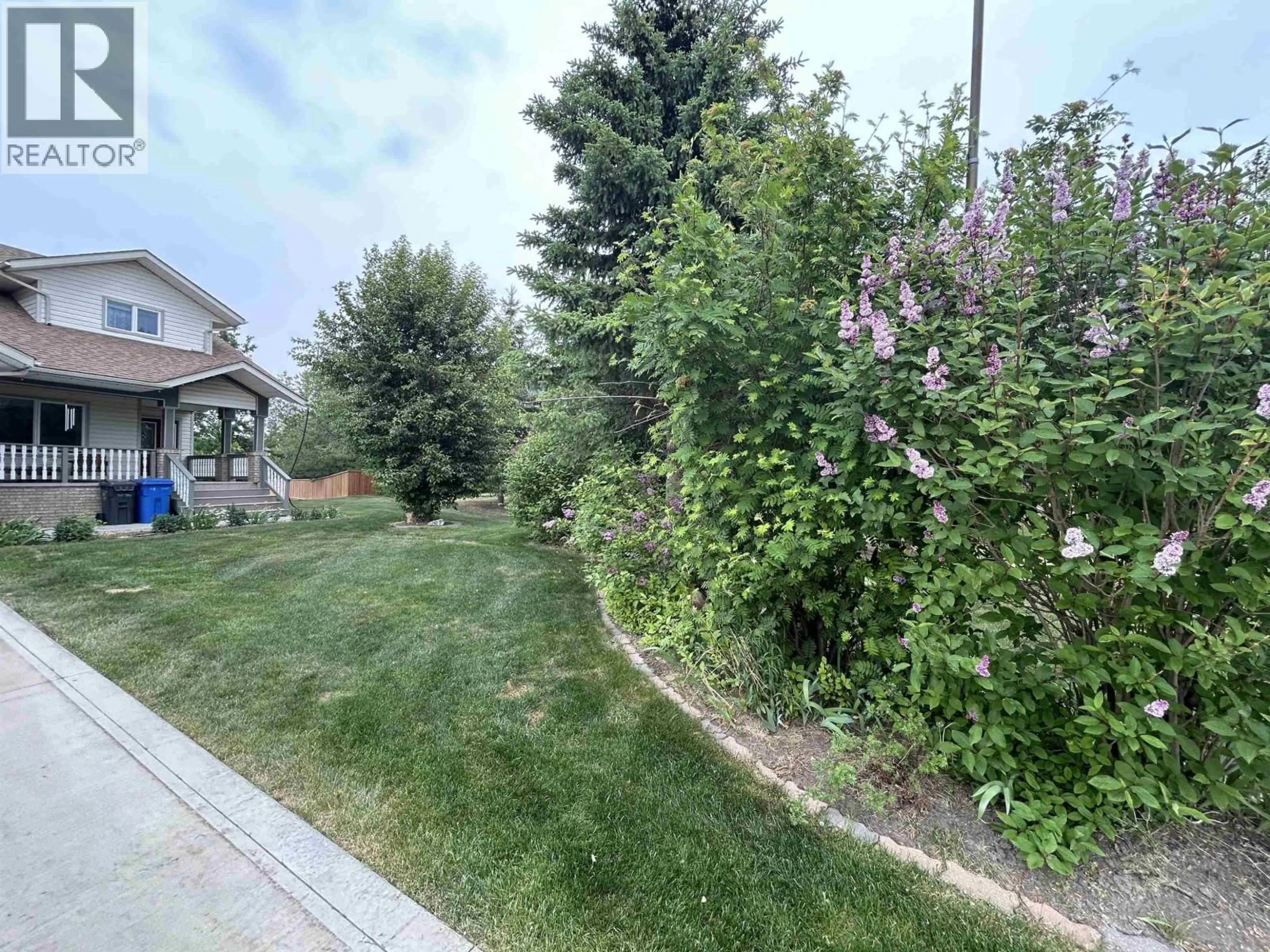 A pic from outside/outdoor area/front of a property/back of a property/a pic from drone, unknown for 11411 109 STREET, Fort St. John British Columbia V1J6W3