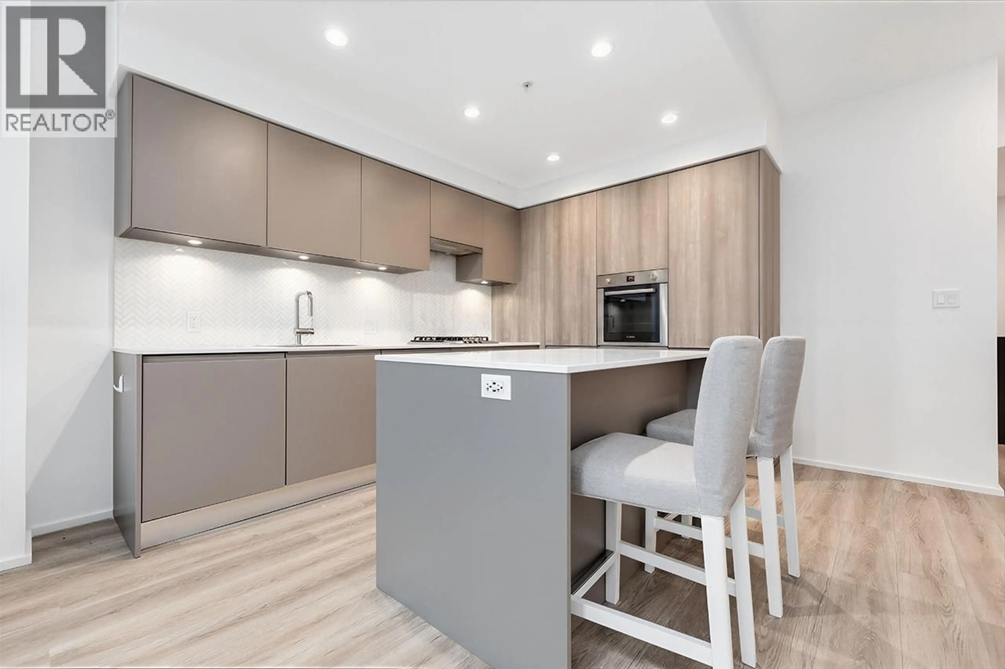 Open concept kitchen, wood/laminate floor for 3211 - 3833 EVERGREEN PLACE, Burnaby British Columbia V3J0M2