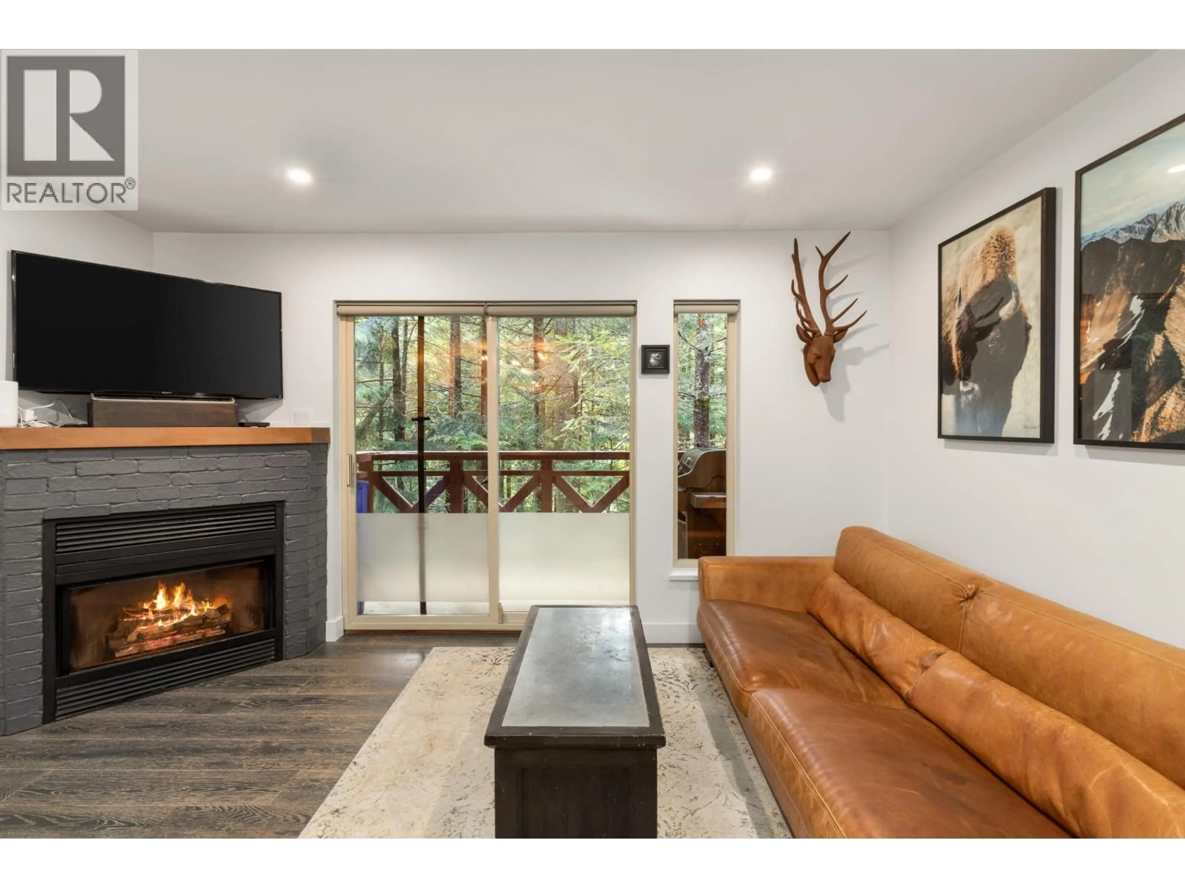 Living room with furniture, unknown for 113 - 3070 HILLCREST DRIVE, Whistler British Columbia V8E0V1