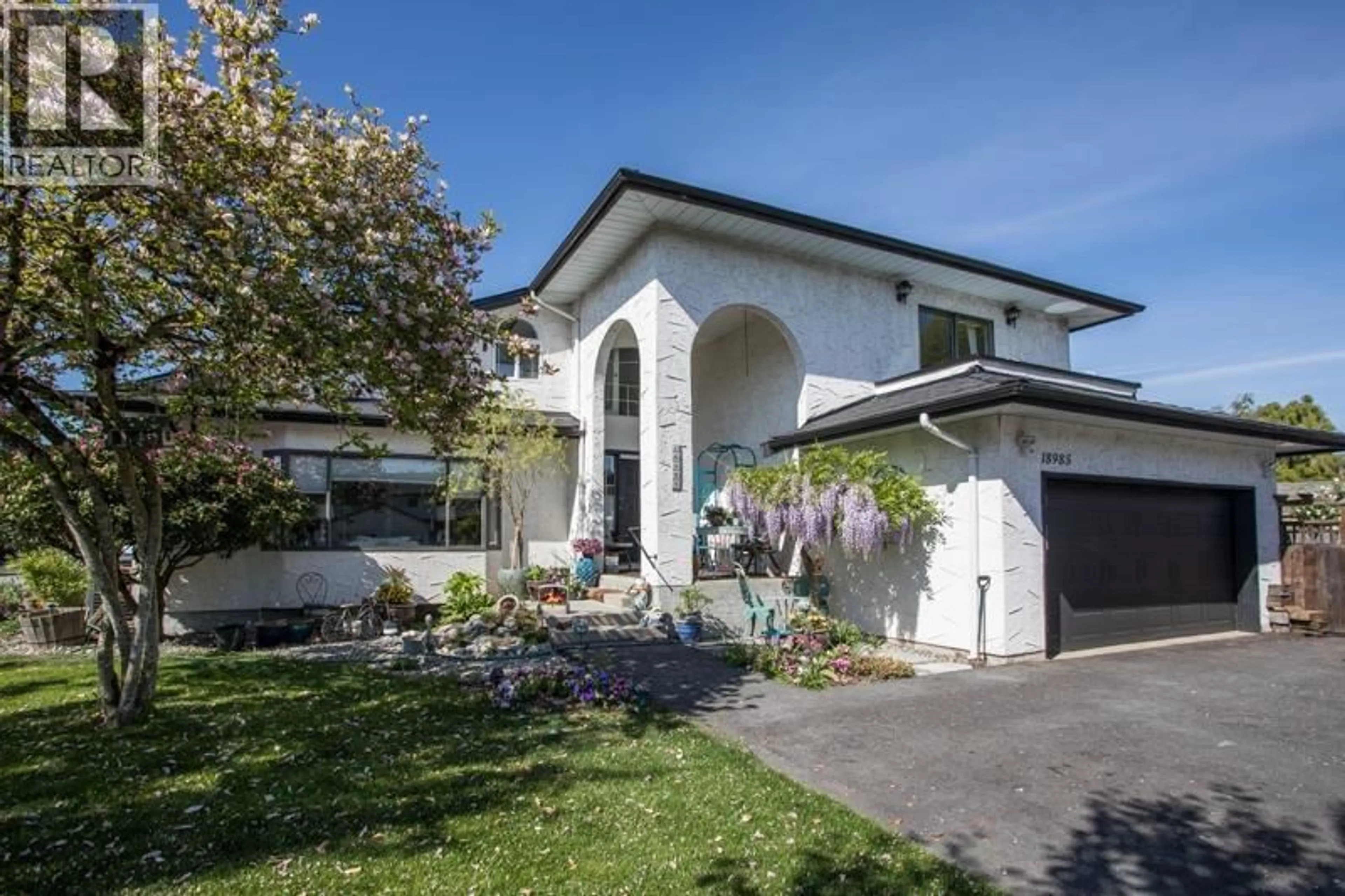 Home with vinyl exterior material, street for 18985 119B AVENUE, Pitt Meadows British Columbia V3Y1X4