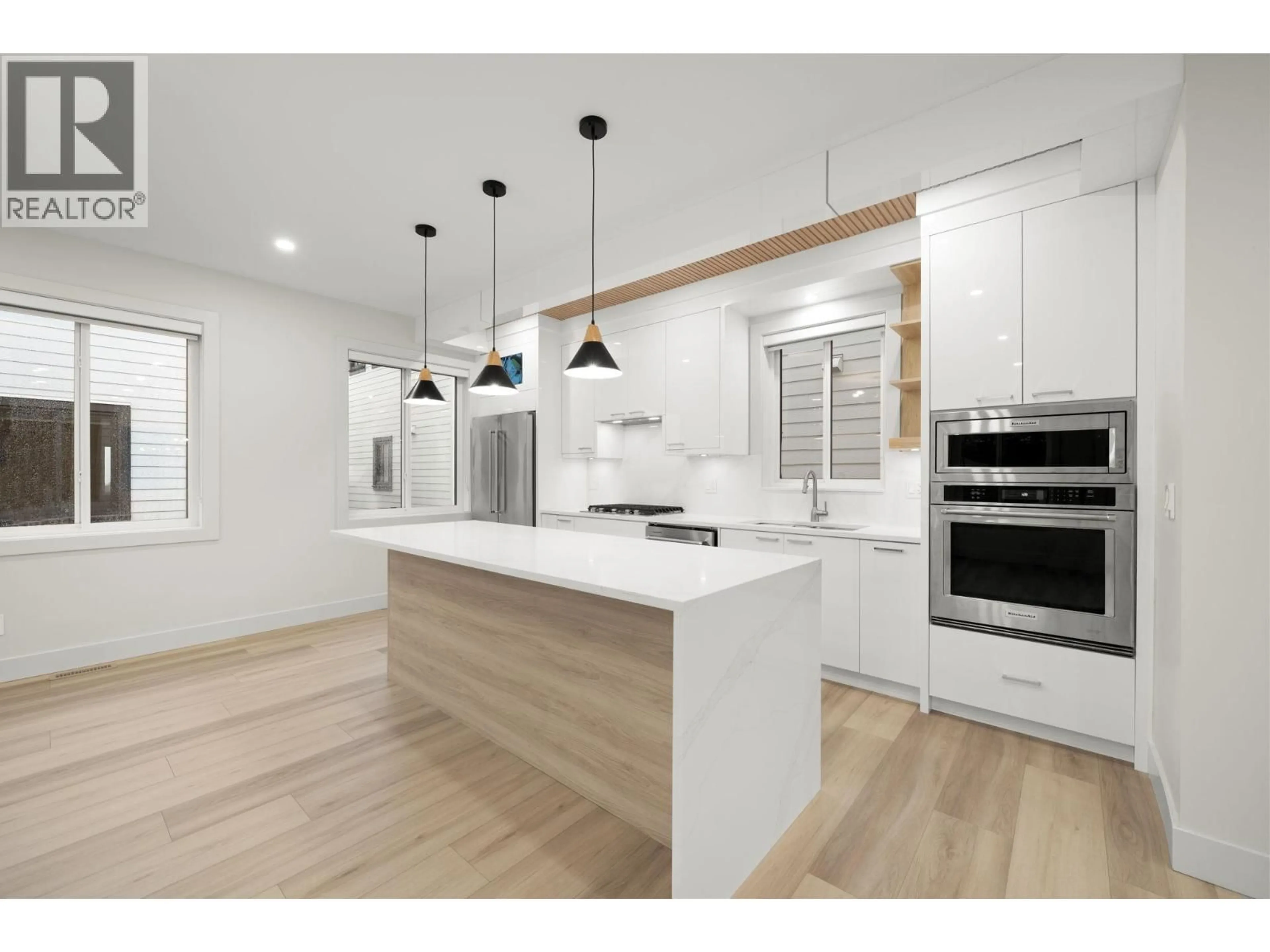 Open concept kitchen, wood/laminate floor for 4 - 3881 HURST STREET, Burnaby British Columbia V5J1M4