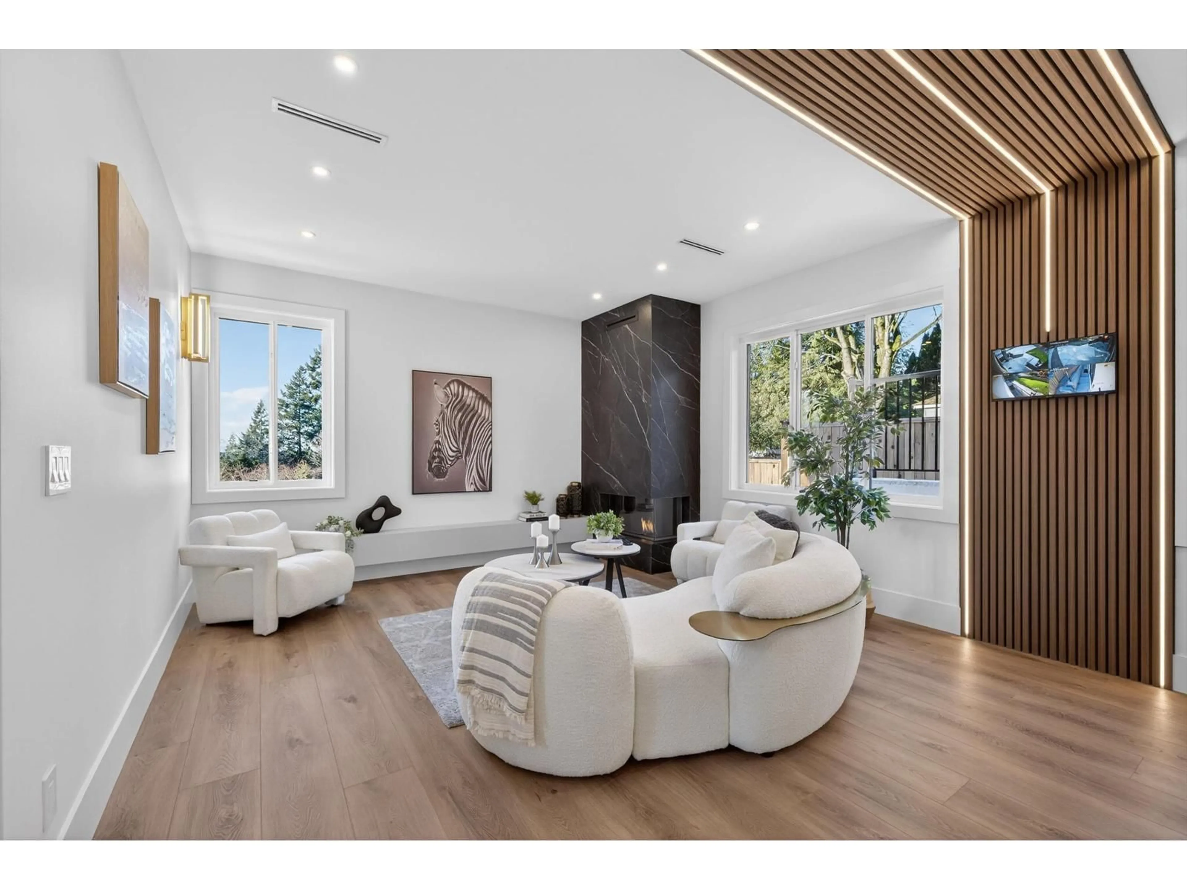 Living room with furniture, wood/laminate floor for 7806 WILTSHIRE BOULEVARD, Delta British Columbia V4C4B3