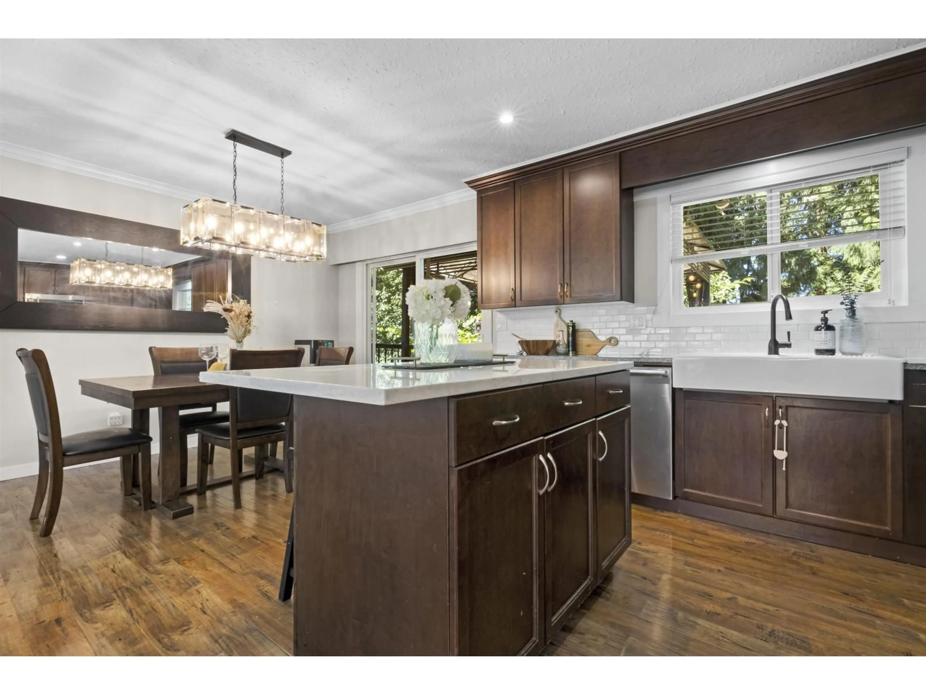 Open concept kitchen, wood/laminate floor for 19745 38A AVENUE, Langley British Columbia V3A4W7