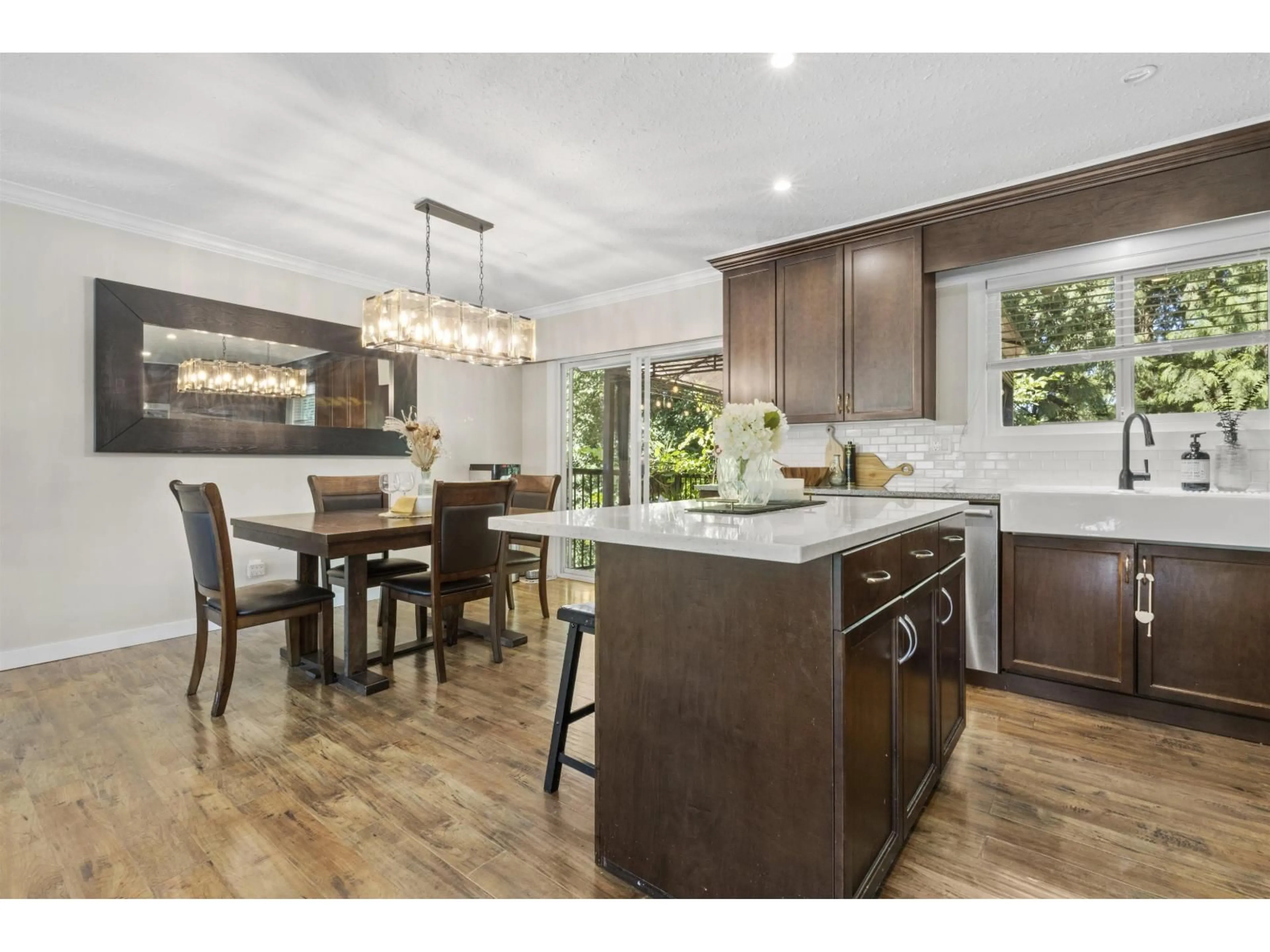 Open concept kitchen, wood/laminate floor for 19745 38A AVENUE, Langley British Columbia V3A4W7