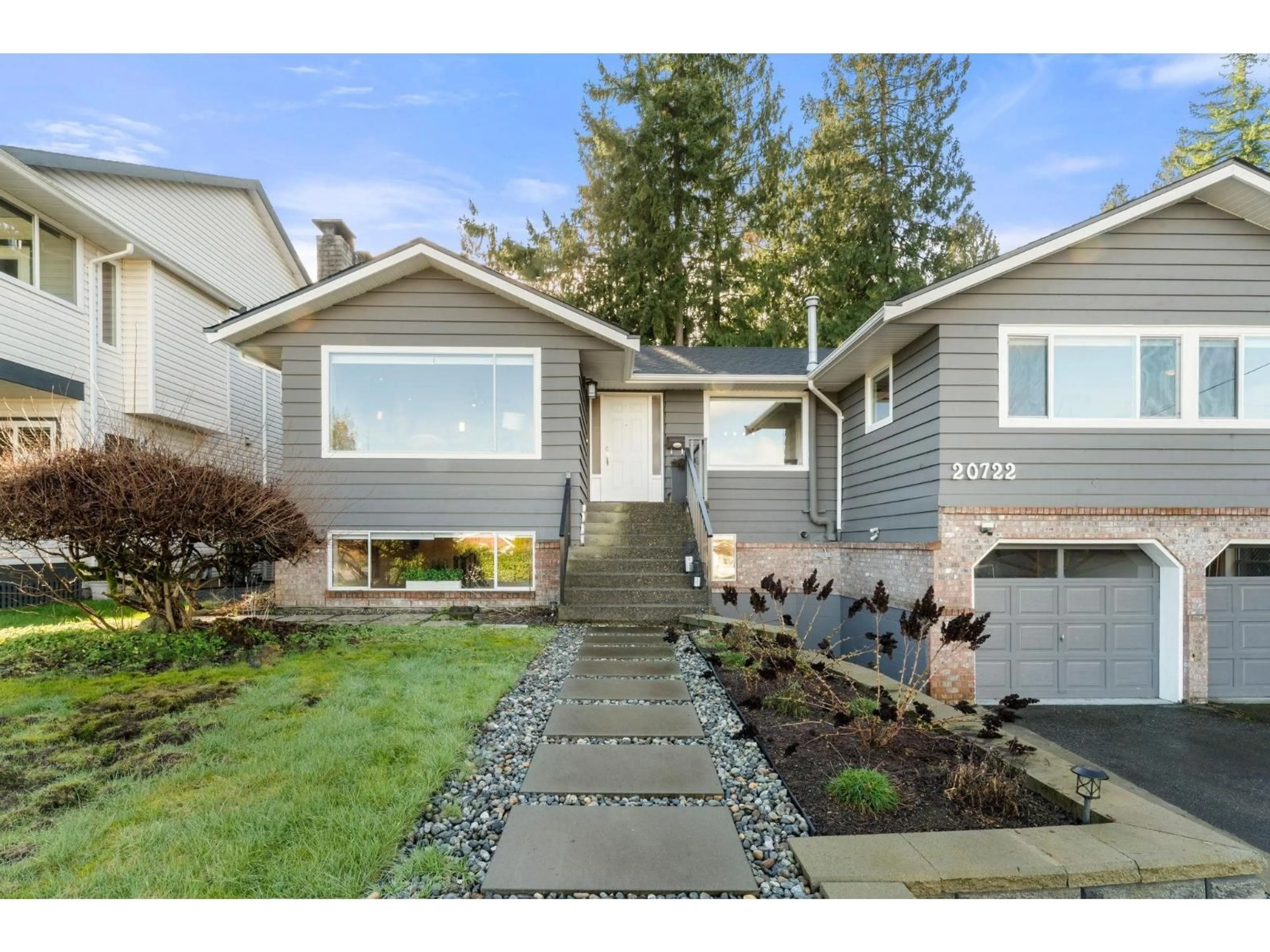 Home with vinyl exterior material, street for 20722 46A AVENUE, Langley British Columbia V3A3J9