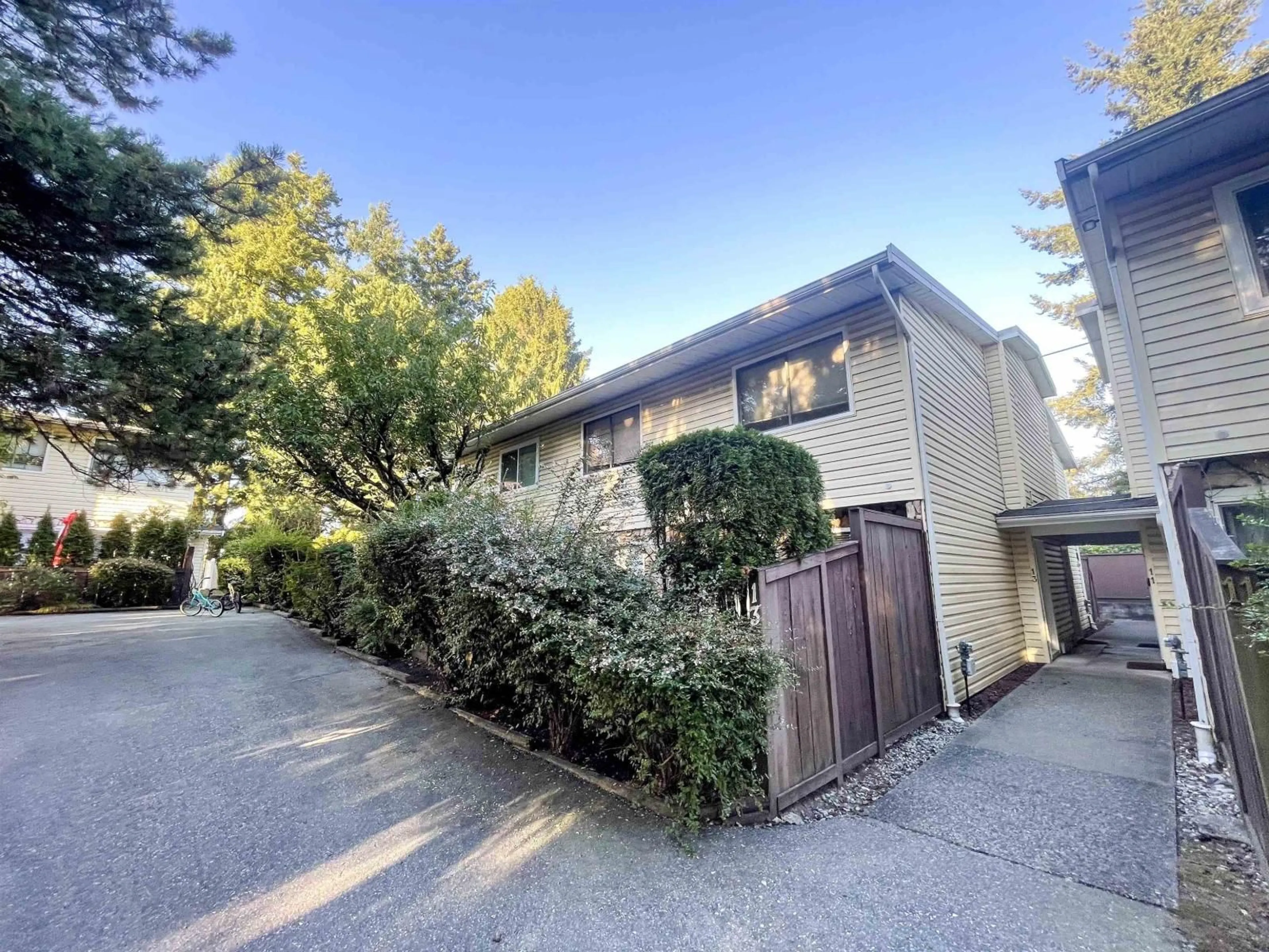 A pic from outside/outdoor area/front of a property/back of a property/a pic from drone, street for 13 - 9402 122 STREET, Surrey British Columbia V3V4L6