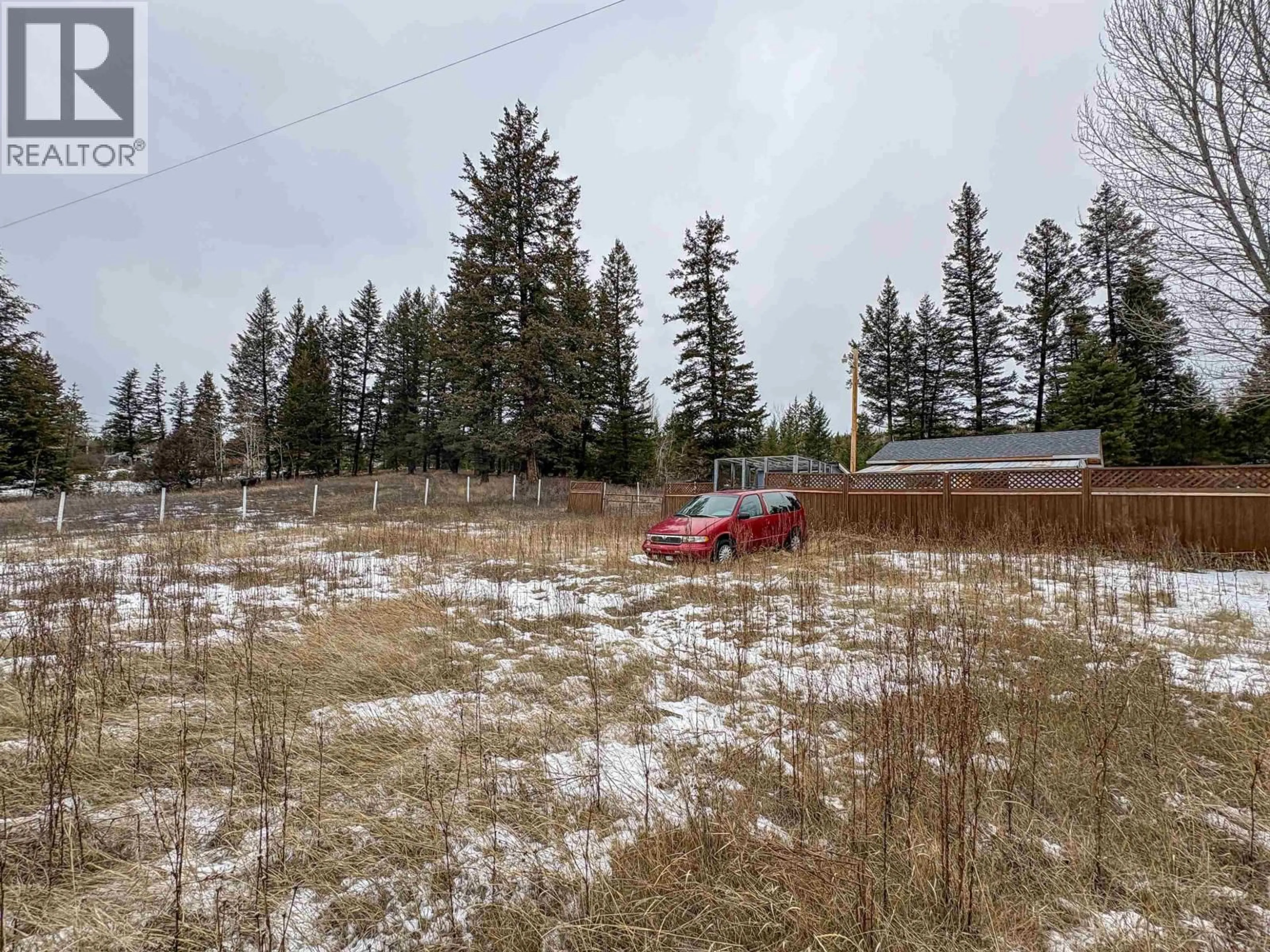 A pic from outside/outdoor area/front of a property/back of a property/a pic from drone, forest/trees view for 3763 DODGE ROAD, 100 Mile House British Columbia V0K1T1