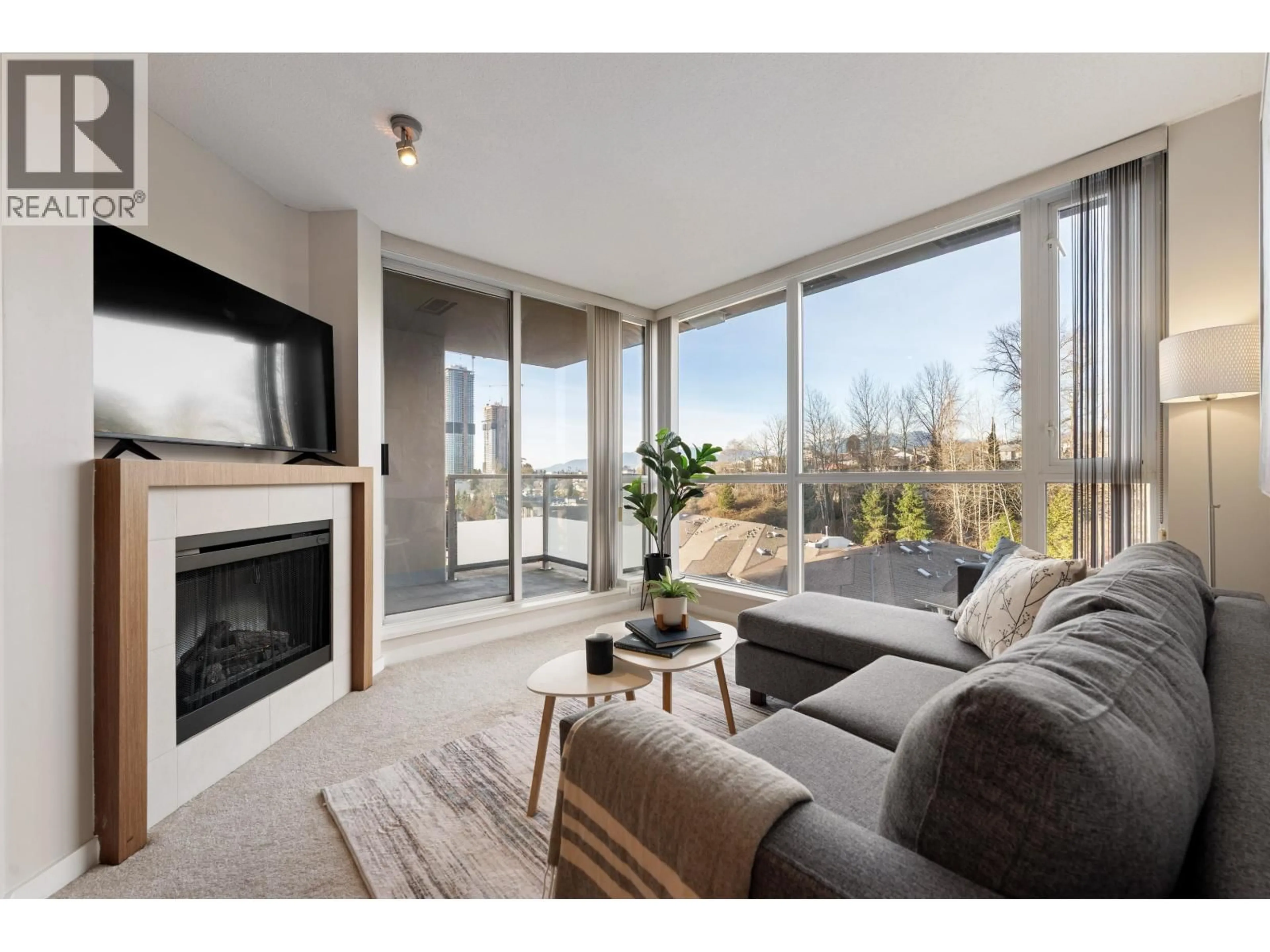 Living room with furniture, wood/laminate floor for 904 - 4888 BRENTWOOD DRIVE, Burnaby British Columbia V5C0C6