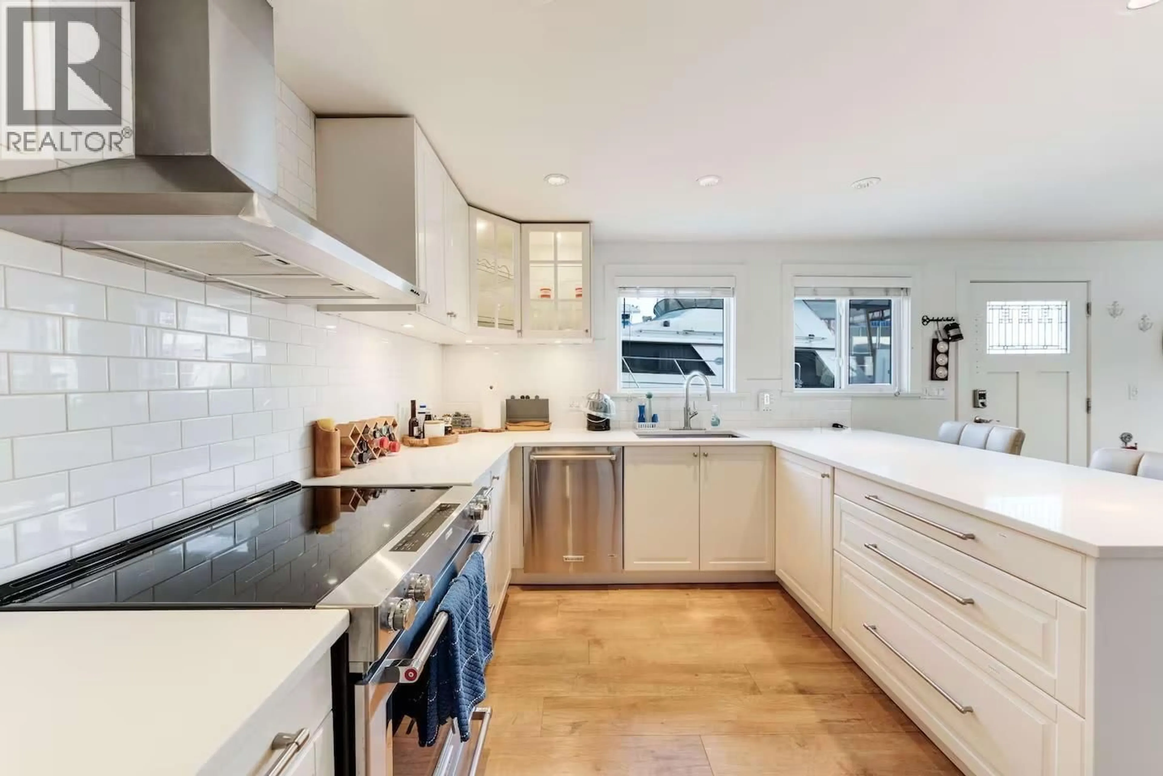 Contemporary kitchen, ceramic/tile floor for A015 - 415 ESPLANADE AVENUE, North Vancouver British Columbia V7M1A6