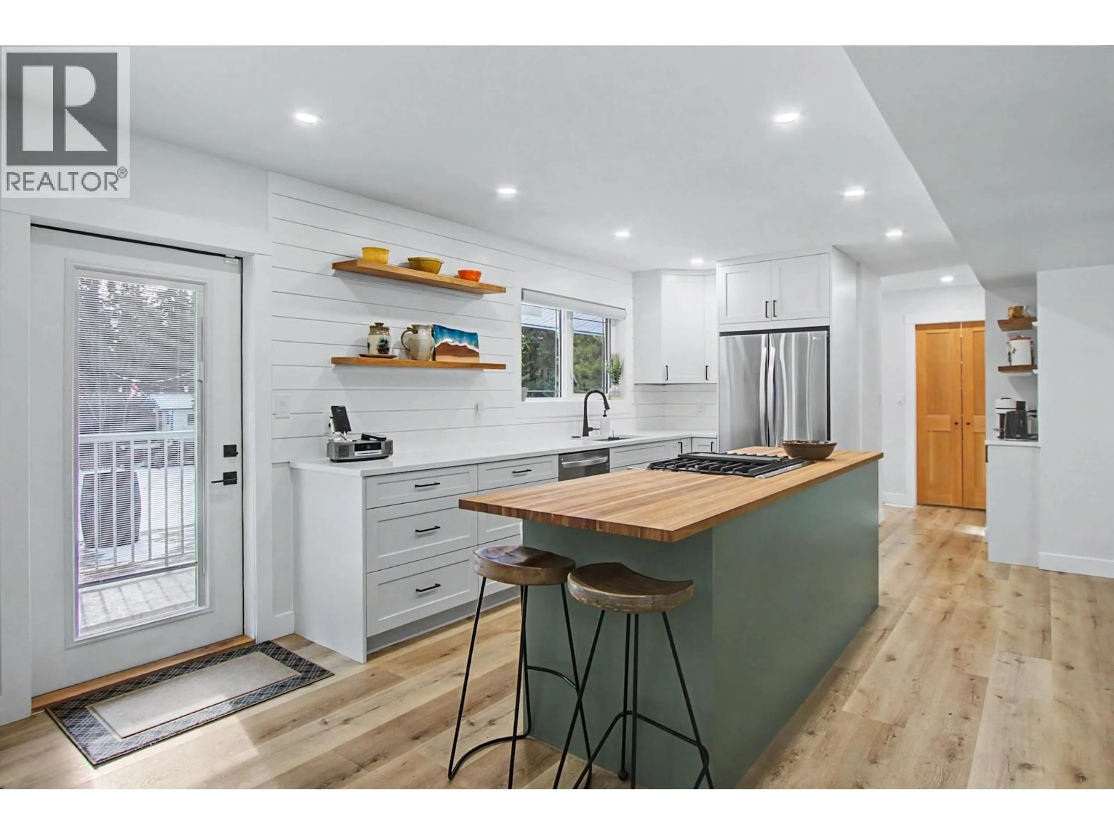 Open concept kitchen, wood/laminate floor for 11845 RUSSELL ROAD, Prince George British Columbia V2N5A7