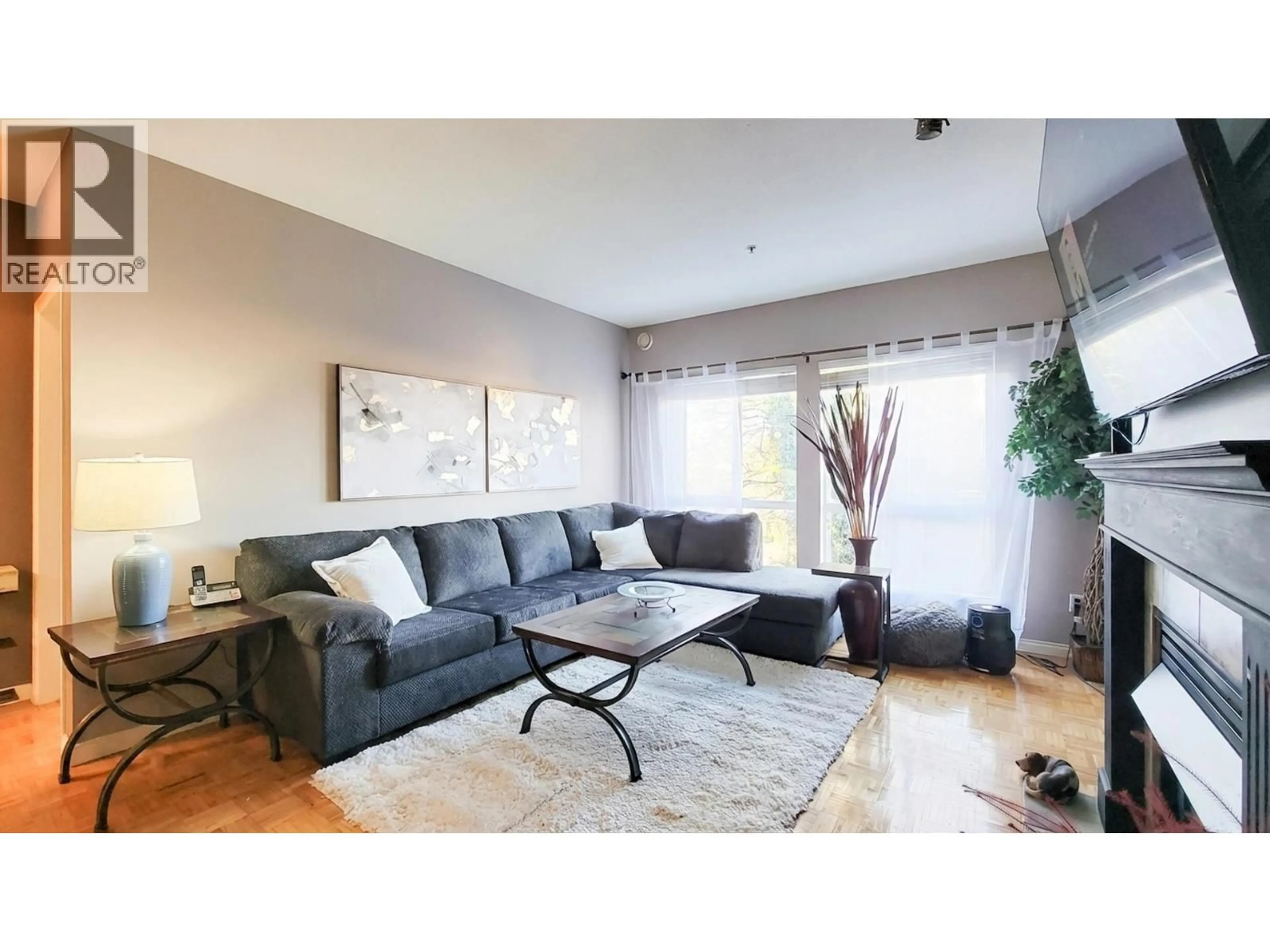 Living room with furniture, unknown for 202 - 19091 MCMYN ROAD, Pitt Meadows British Columbia V3Y2S8