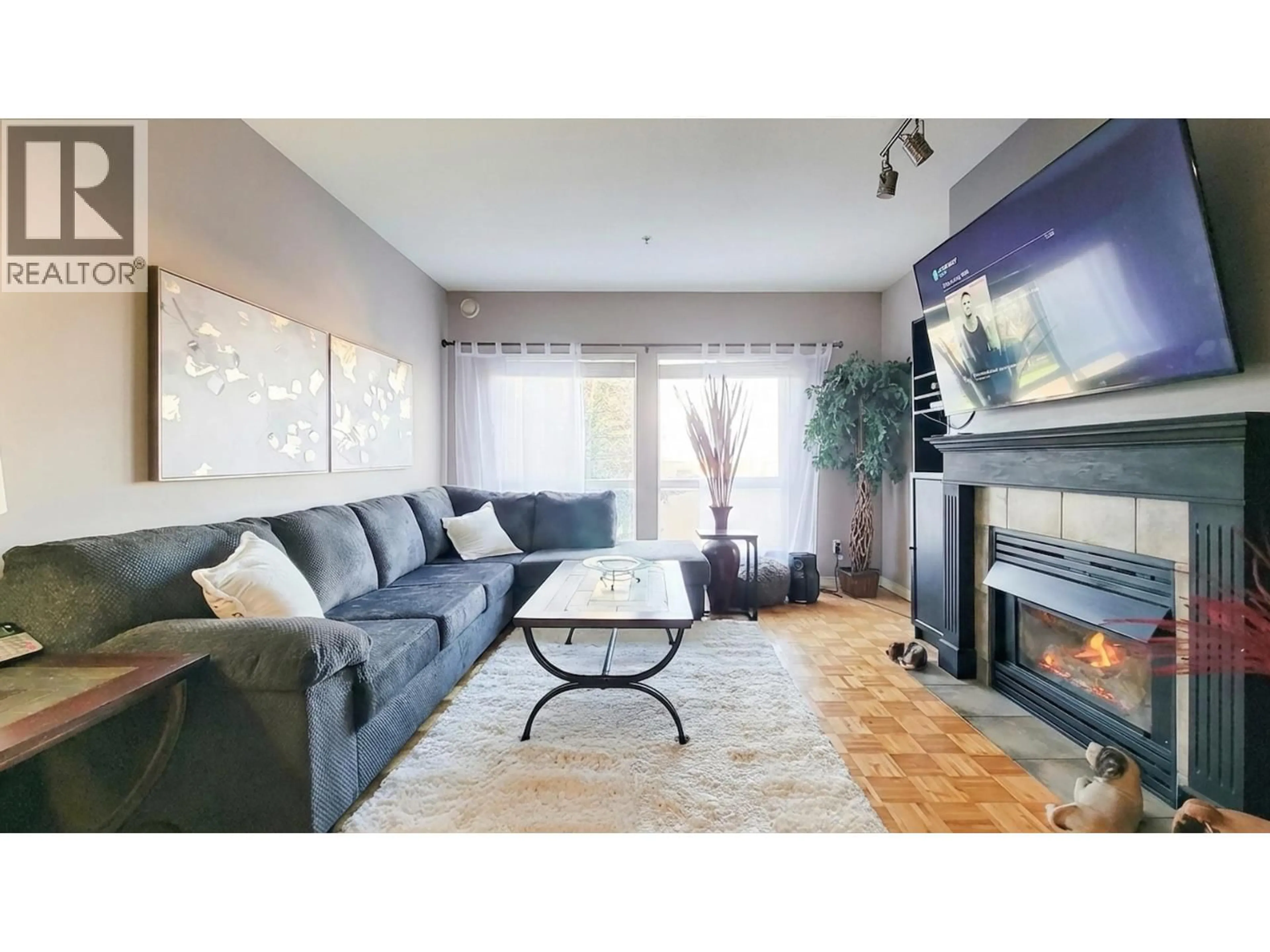 Living room with furniture, unknown for 202 - 19091 MCMYN ROAD, Pitt Meadows British Columbia V3Y2S8