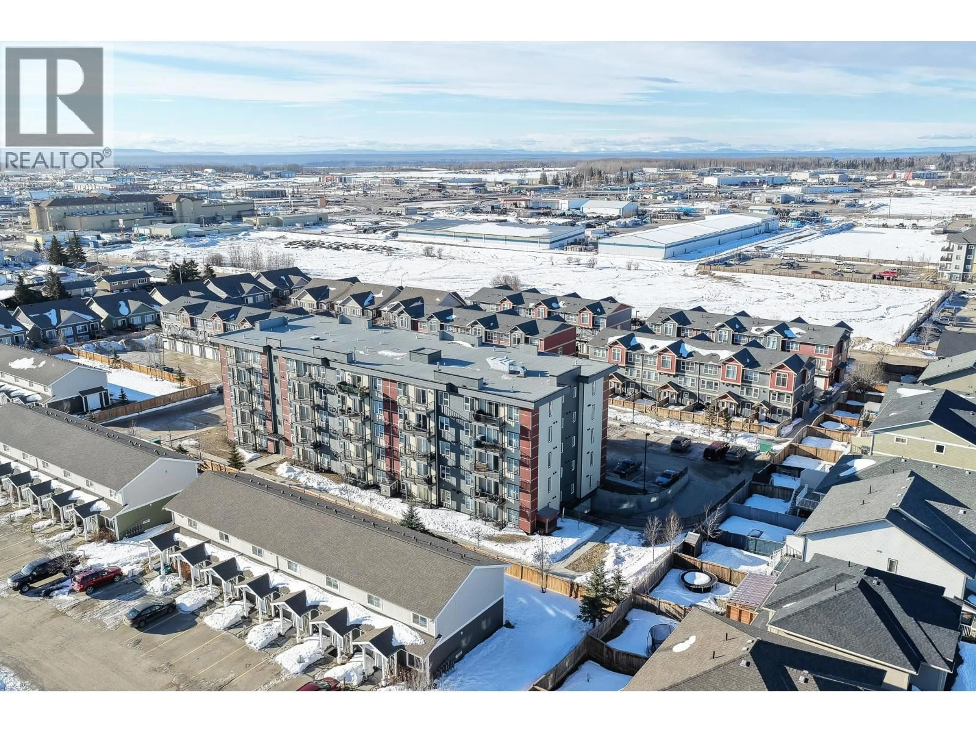 A pic from outside/outdoor area/front of a property/back of a property/a pic from drone, unknown for 204 - 10307 112 STREET, Fort St. John British Columbia V1J0N6
