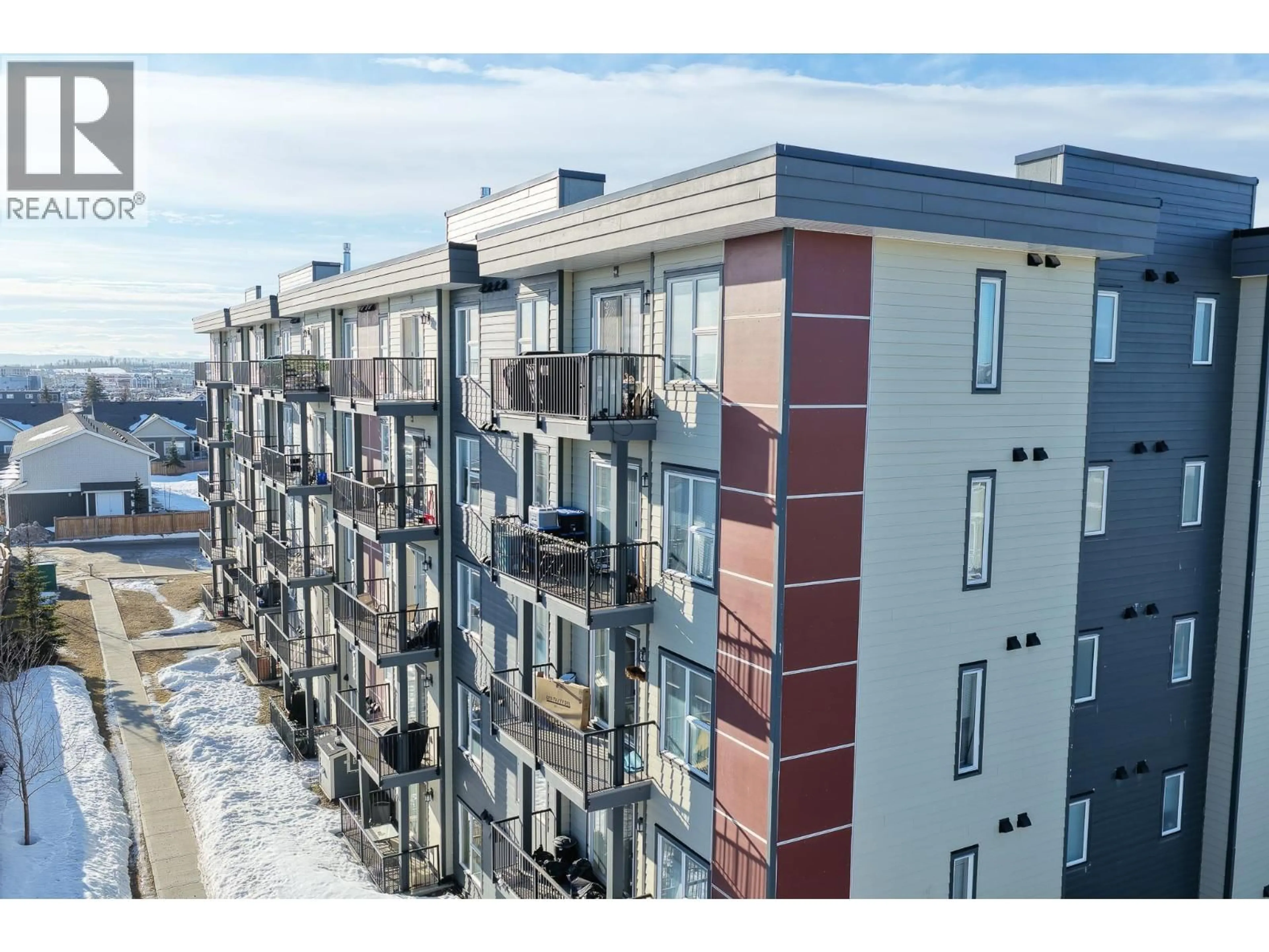 A pic from outside/outdoor area/front of a property/back of a property/a pic from drone, unknown for 204 - 10307 112 STREET, Fort St. John British Columbia V1J0N6