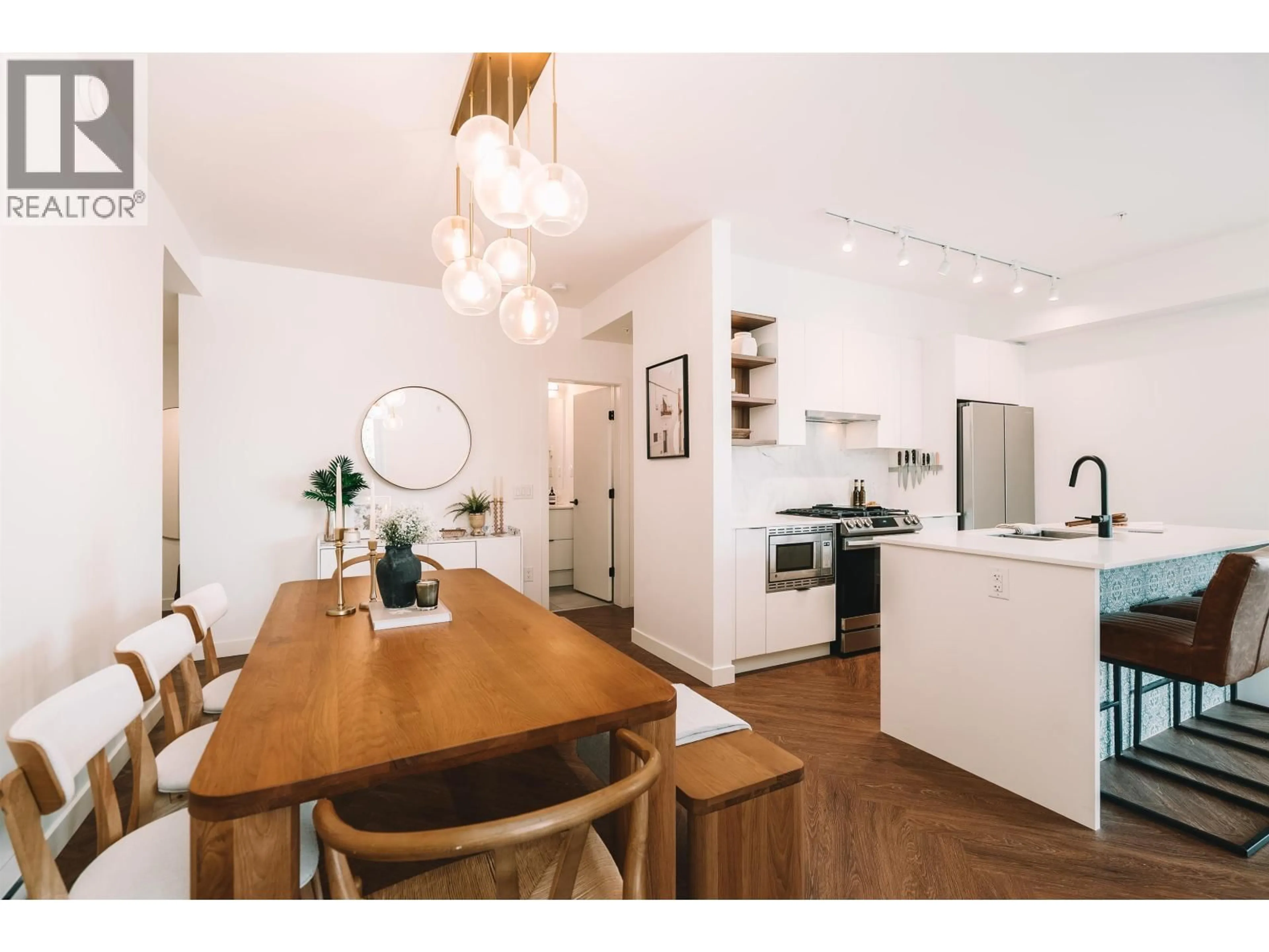 Open concept kitchen, wood/laminate floor for 509 - 3229 ST JOHNS STREET, Port Moody British Columbia V3H0M4