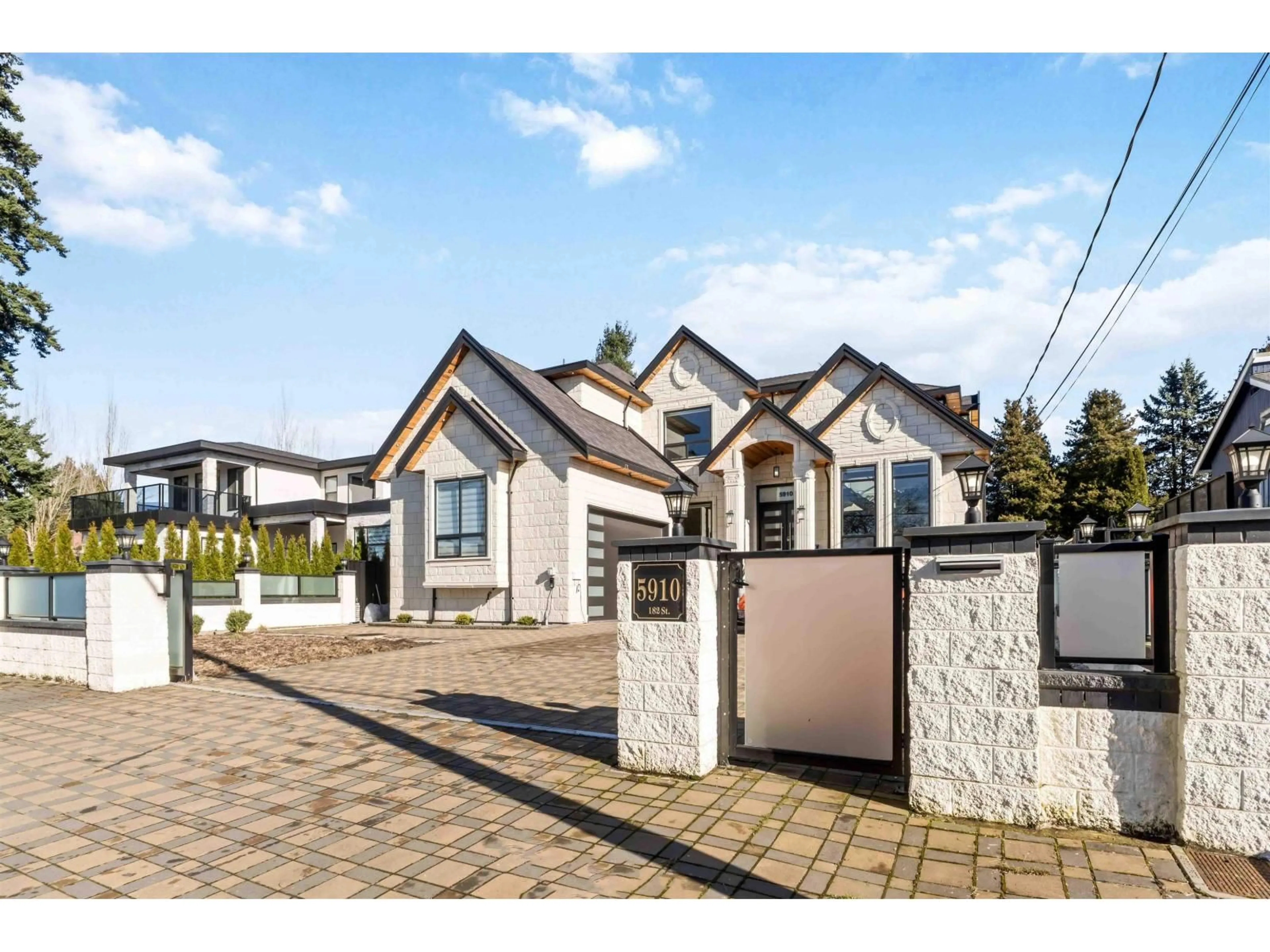 Home with brick exterior material, street for 5910 182 STREET, Surrey British Columbia V3S4M7