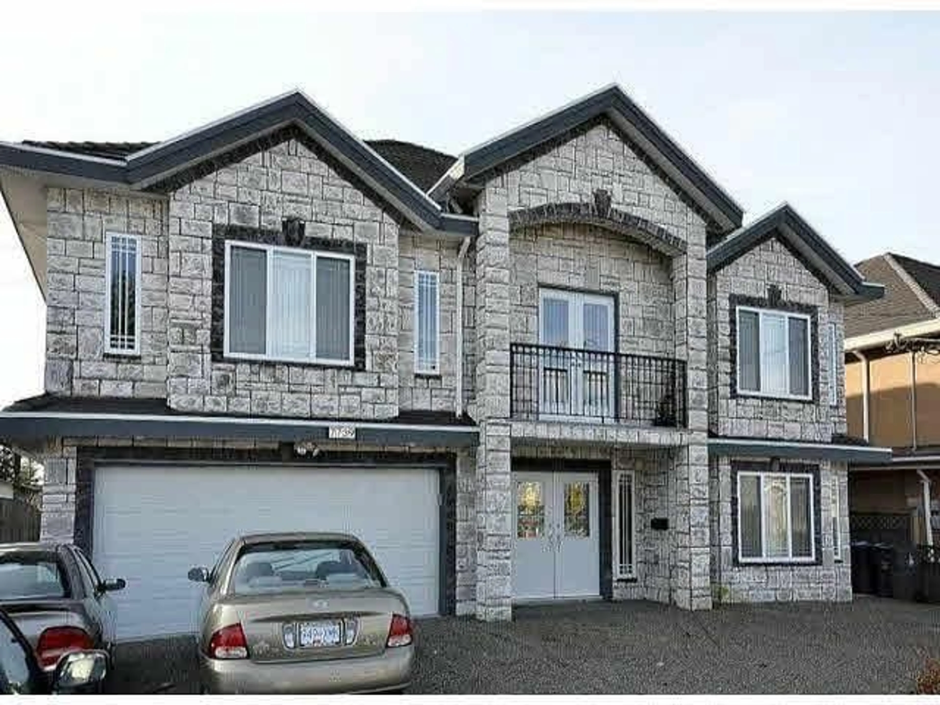 Home with brick exterior material, building for 7739 126A STREET, Surrey British Columbia V3W6Z9