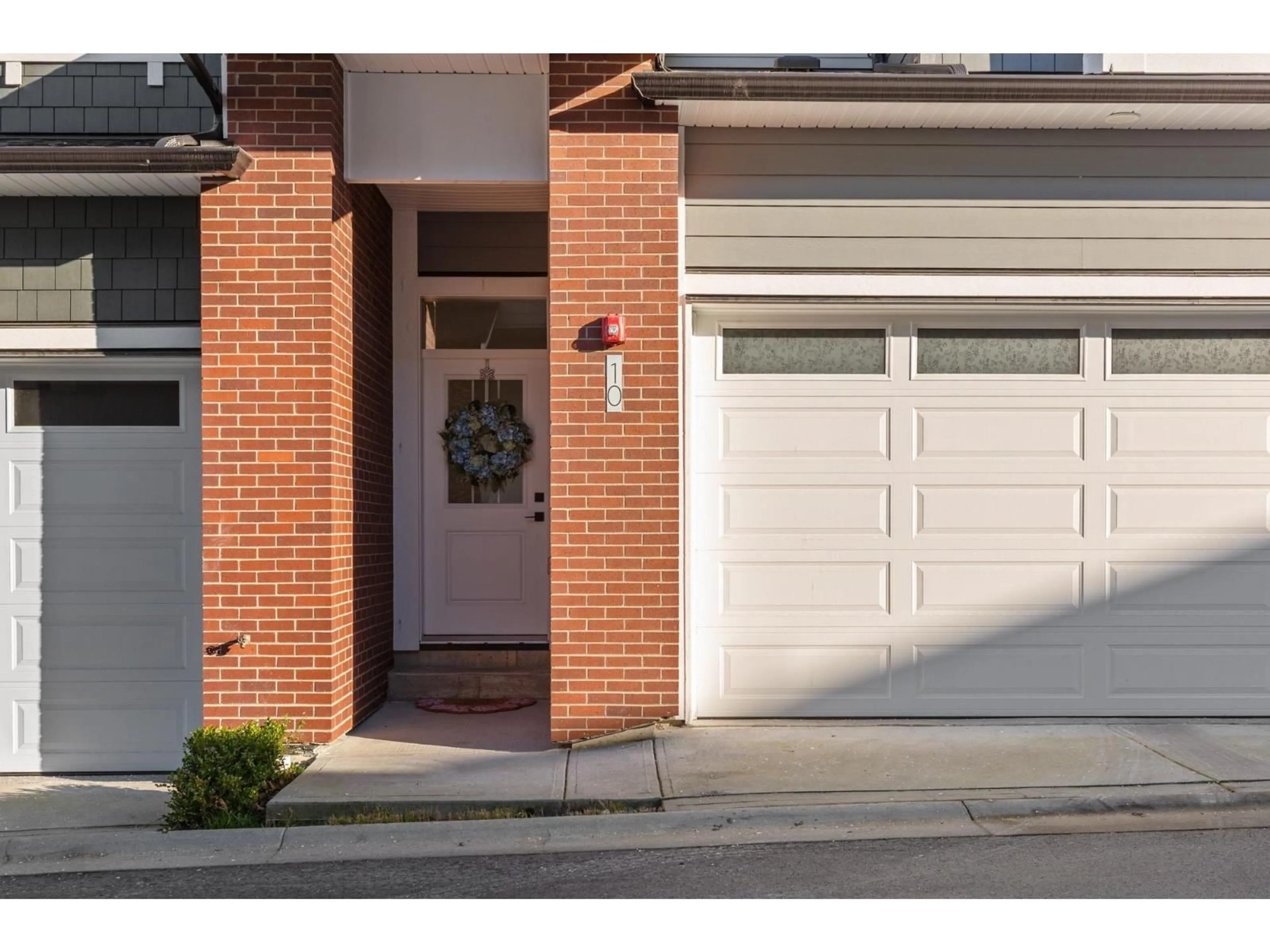 Home with brick exterior material, street for 10 - 7640 197 STREET, Langley British Columbia V2Y3W2