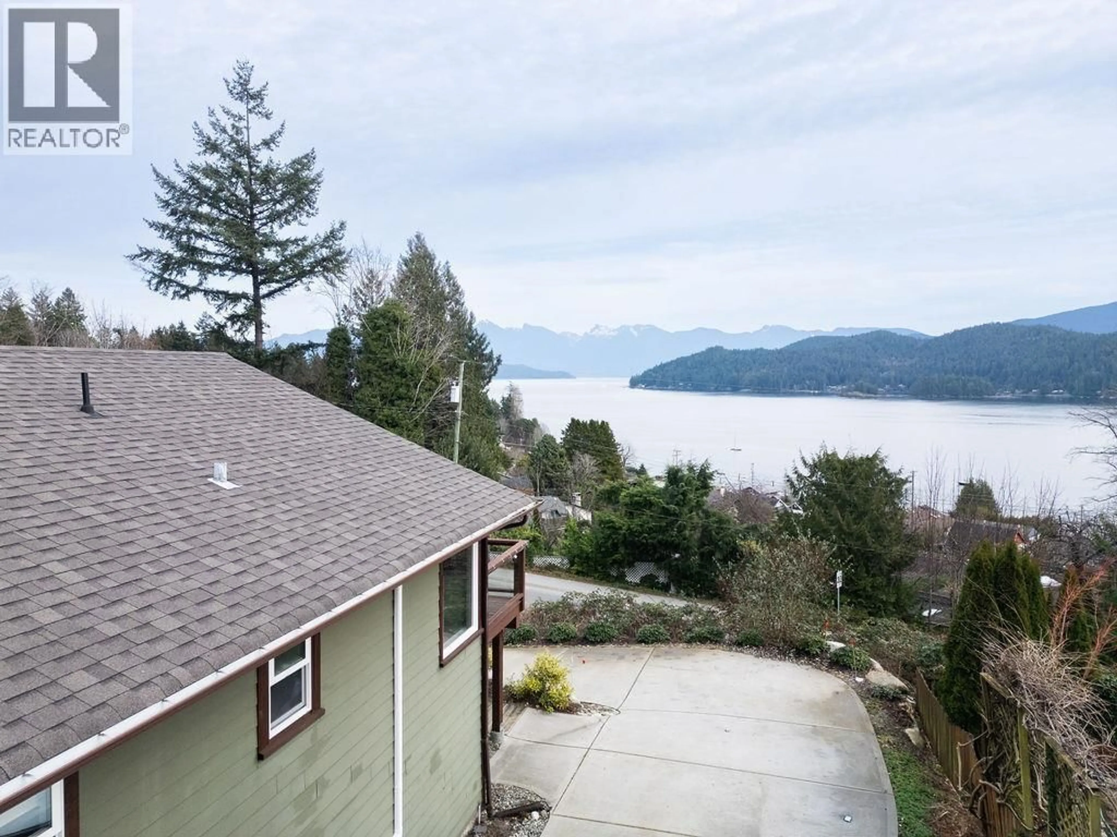 A pic from outside/outdoor area/front of a property/back of a property/a pic from drone, water/lake/river/ocean view for 591 GIBSONS WAY, Gibsons British Columbia V0N1V9