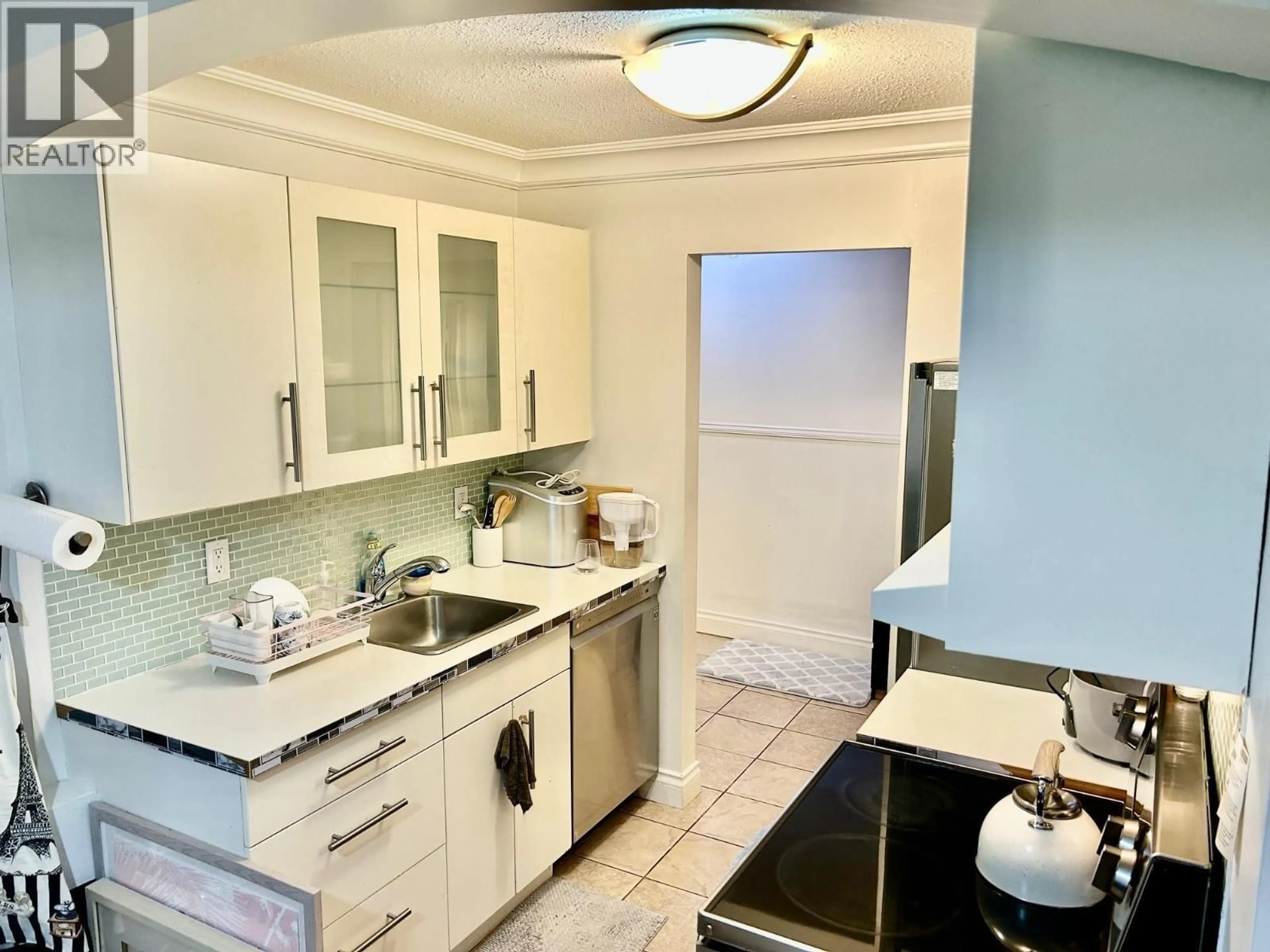 Standard kitchen, ceramic/tile floor for 112 - 240 MAHON AVENUE, North Vancouver British Columbia V7M3H4