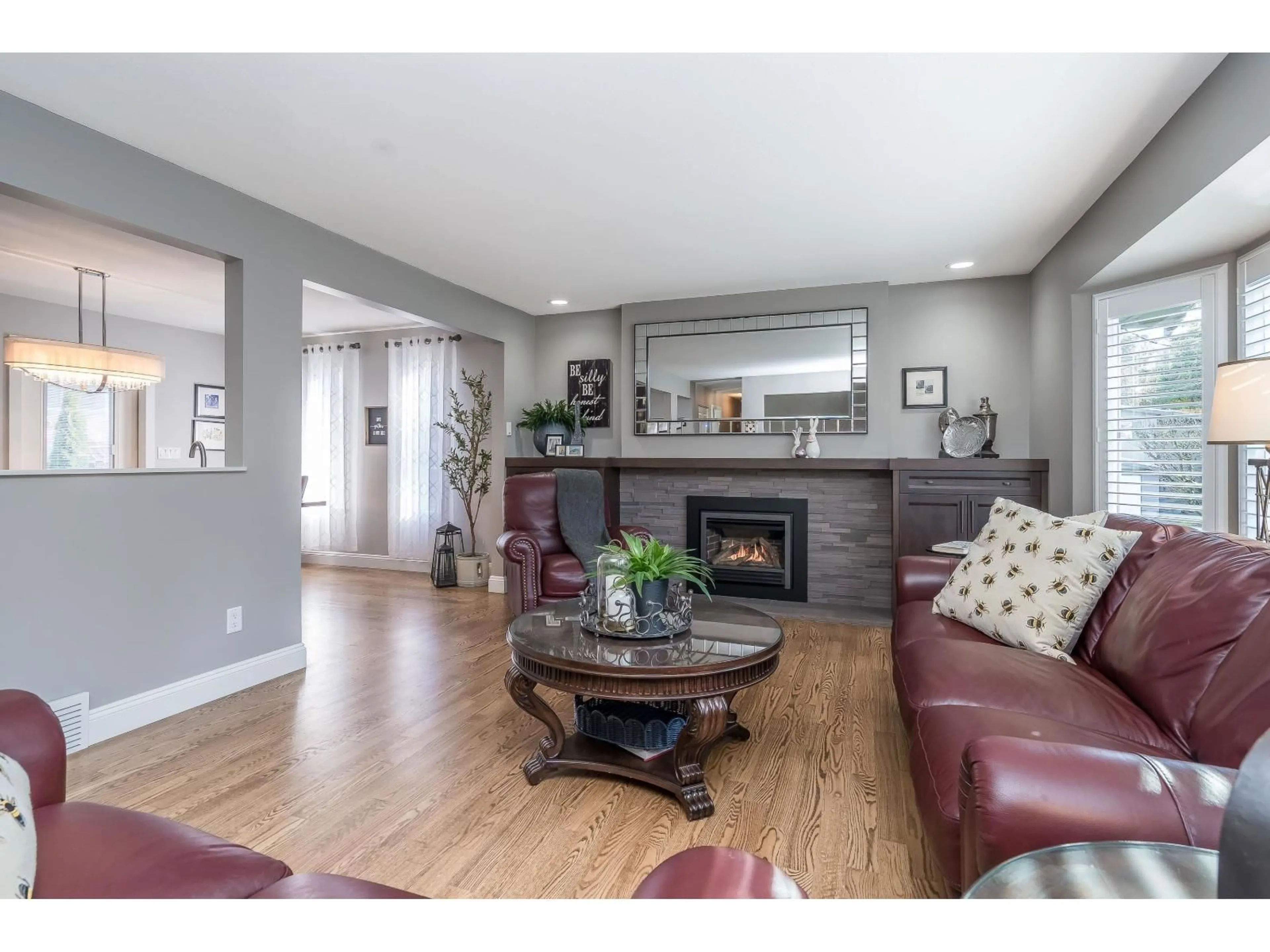 Living room with furniture, wood/laminate floor for 7341 MINSTER DRIVE SOUTH, Delta British Columbia V4C4M2