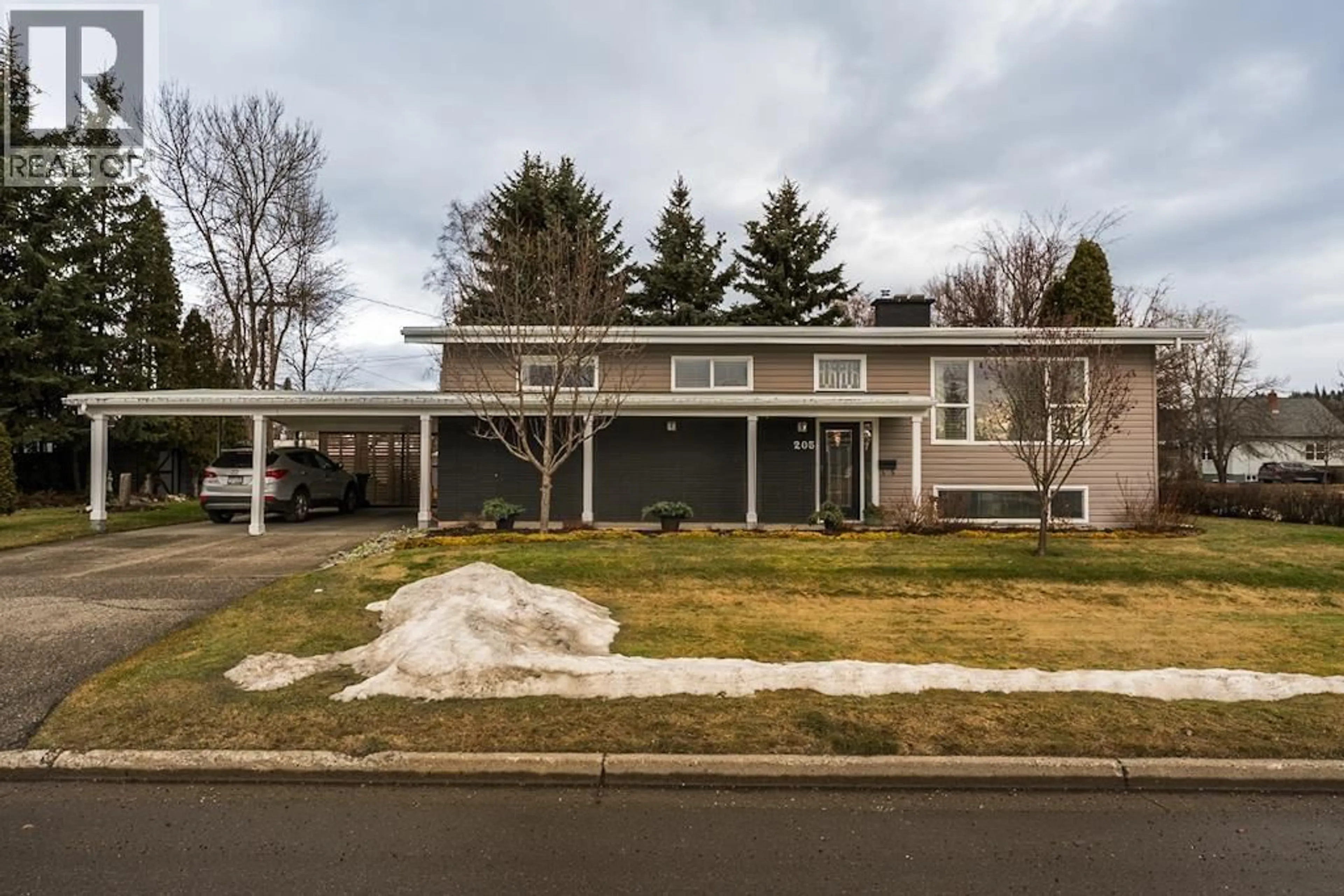 Home with vinyl exterior material, street for 205 NICHOLSON STREET, Prince George British Columbia V2M3H1