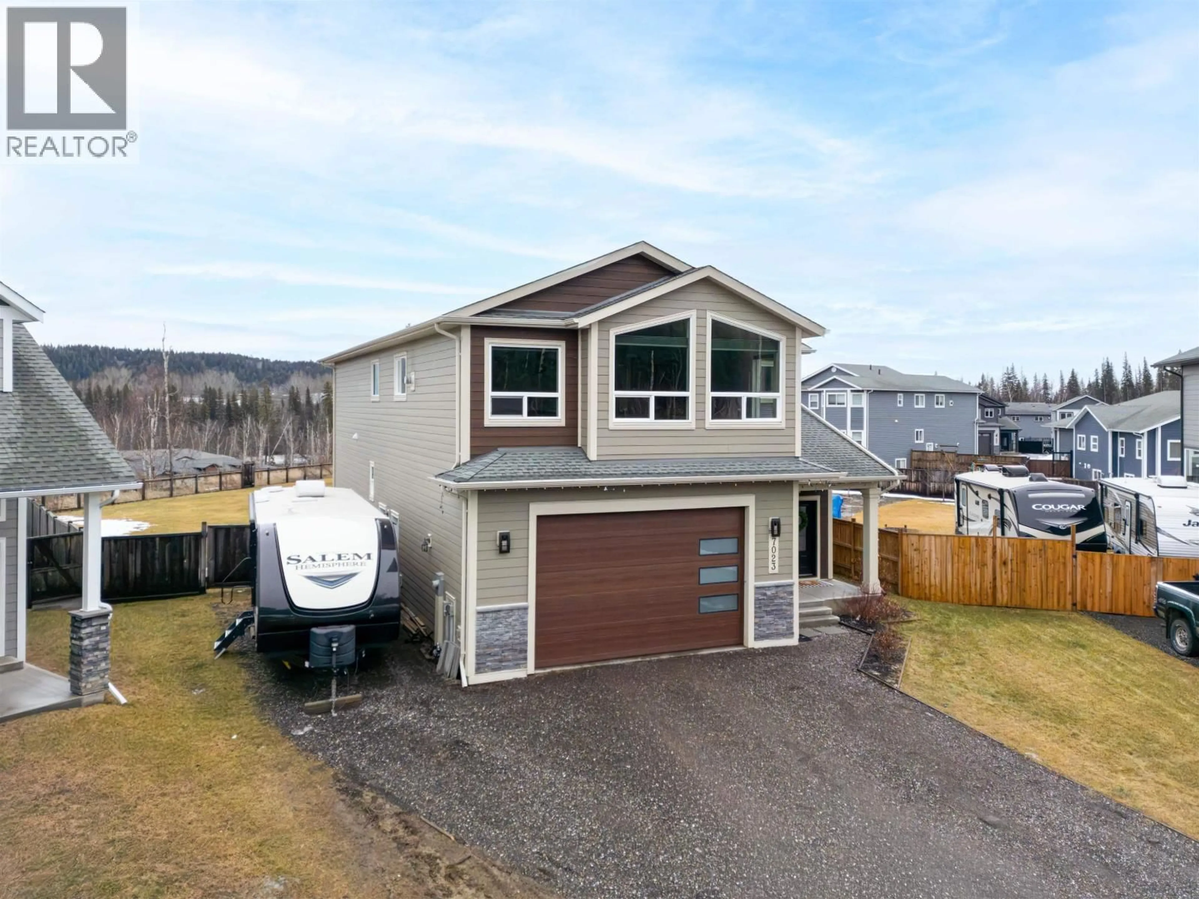 A pic from outside/outdoor area/front of a property/back of a property/a pic from drone, unknown for 7023 STONECREEK PLACE, Prince George British Columbia V2N0H2