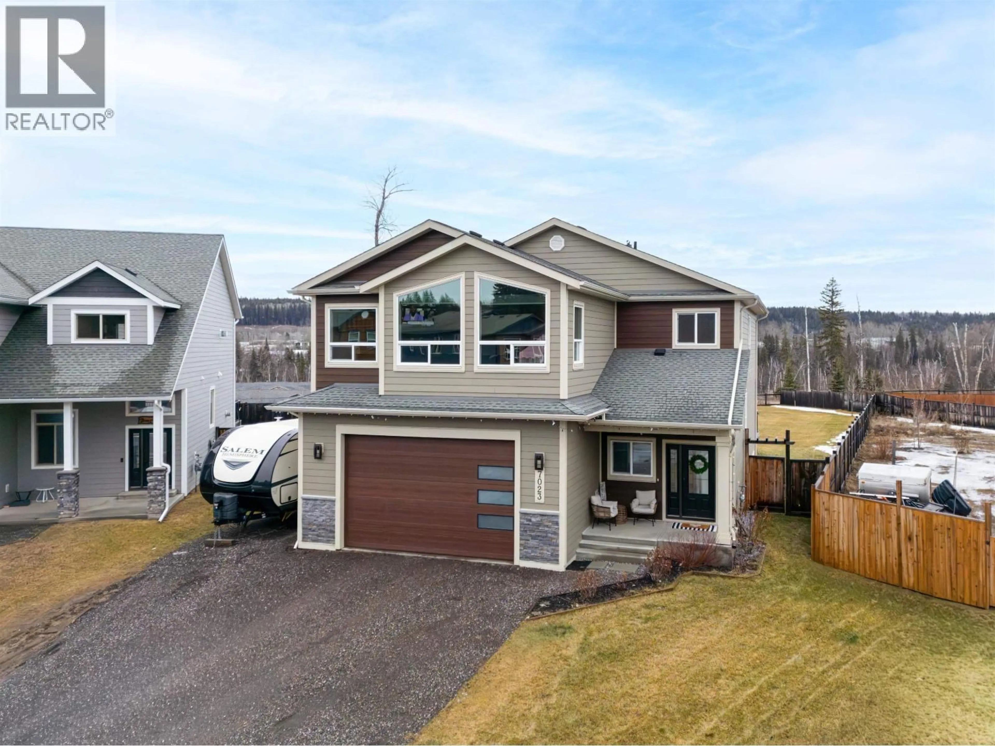 Home with vinyl exterior material, street for 7023 STONECREEK PLACE, Prince George British Columbia V2N0H2