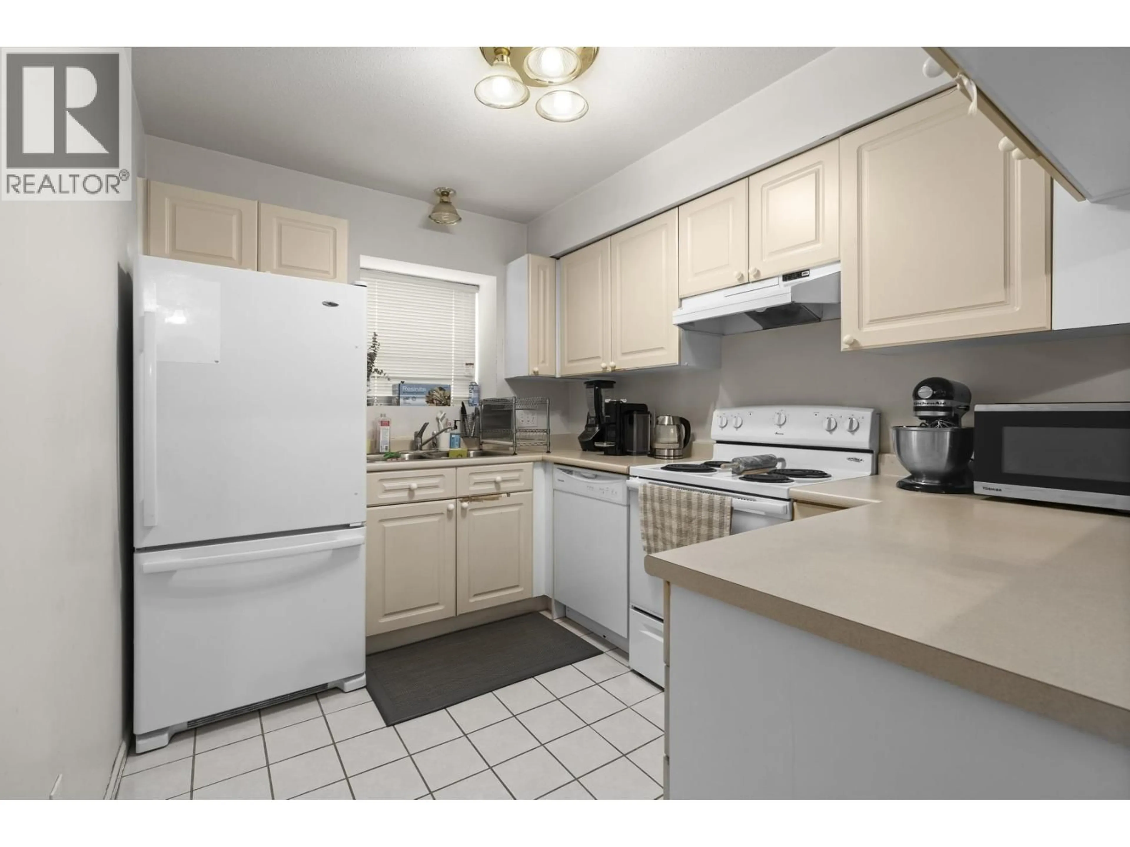 Standard kitchen, unknown for 202 - 7011 BLUNDELL ROAD, Richmond British Columbia V6Y1J5