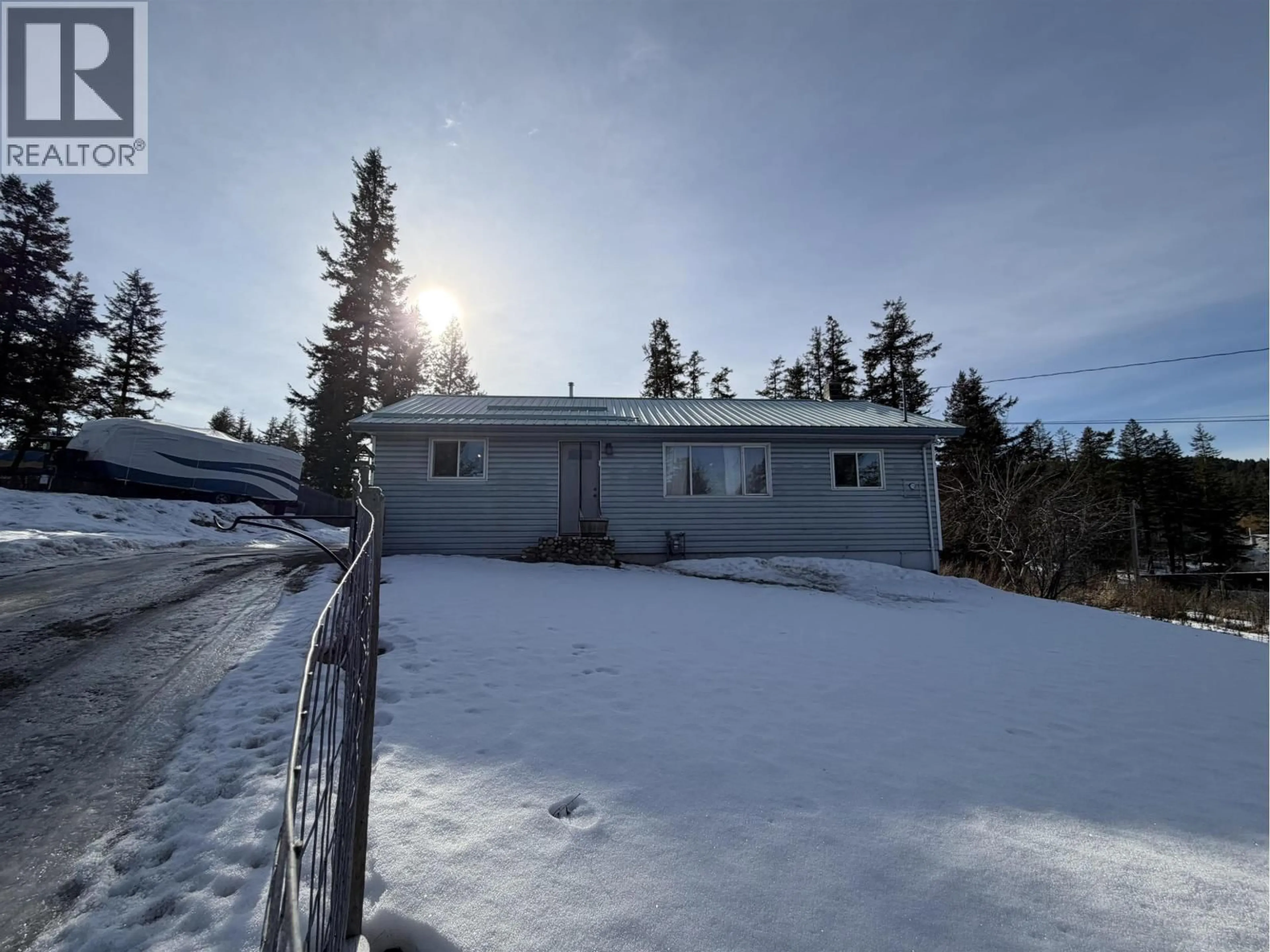 A pic from outside/outdoor area/front of a property/back of a property/a pic from drone, mountain view for 915 DOG CREEK ROAD, Williams Lake British Columbia V2G3G5