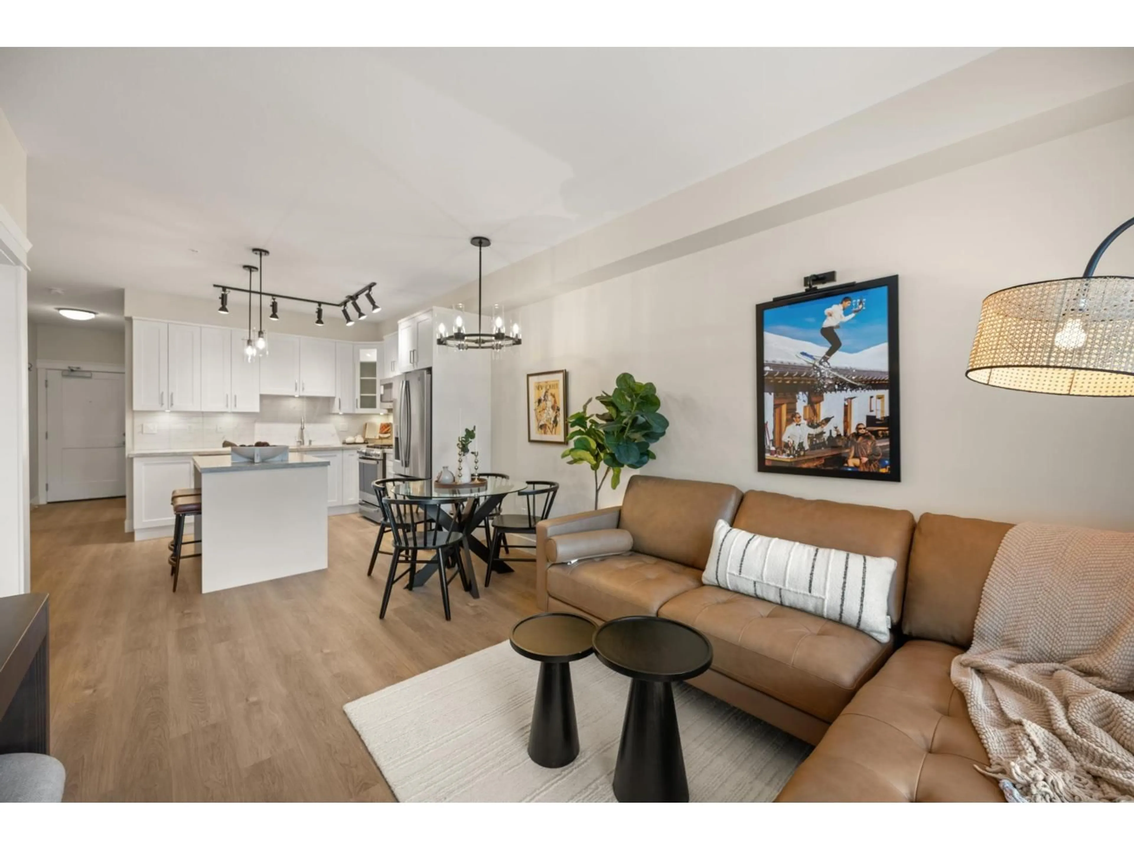 Open concept kitchen, wood/laminate floor for 109 - 20926 83 AVENUE AVENUE, Langley British Columbia V2Y3Y9