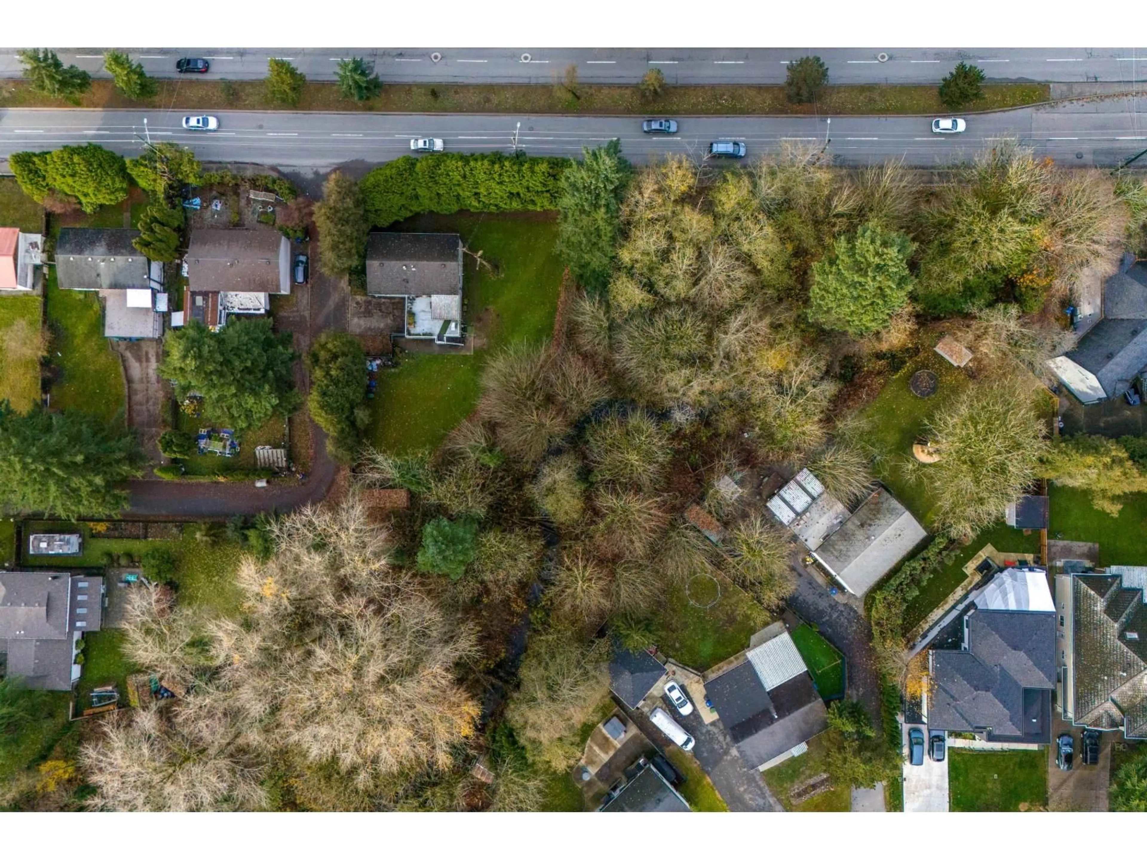 A pic from outside/outdoor area/front of a property/back of a property/a pic from drone, street for 14908 88 AVENUE, Surrey British Columbia V3S2S5