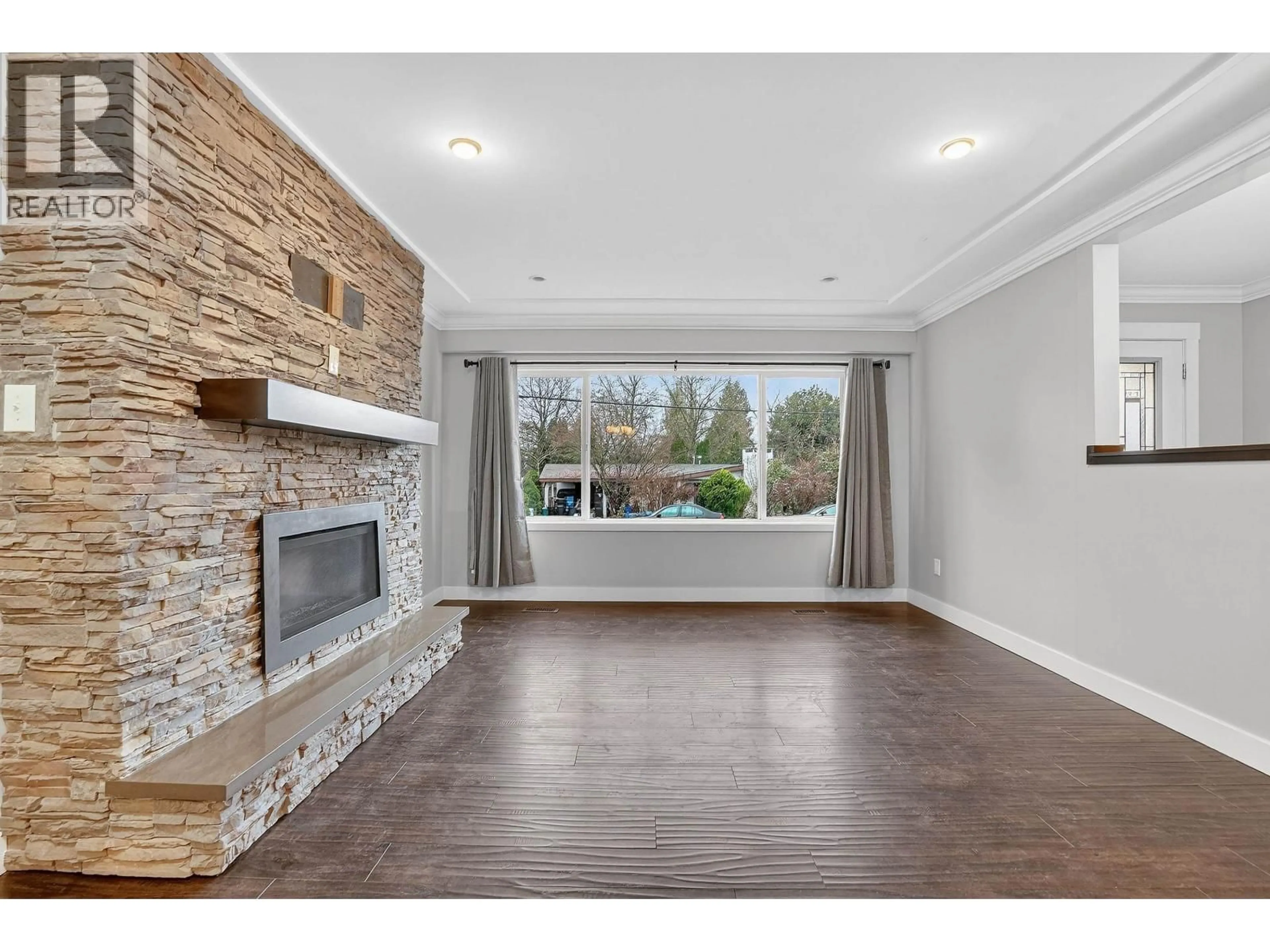 Living room with furniture, wood/laminate floor for 12106 214 STREET, Maple Ridge British Columbia V2X5E1