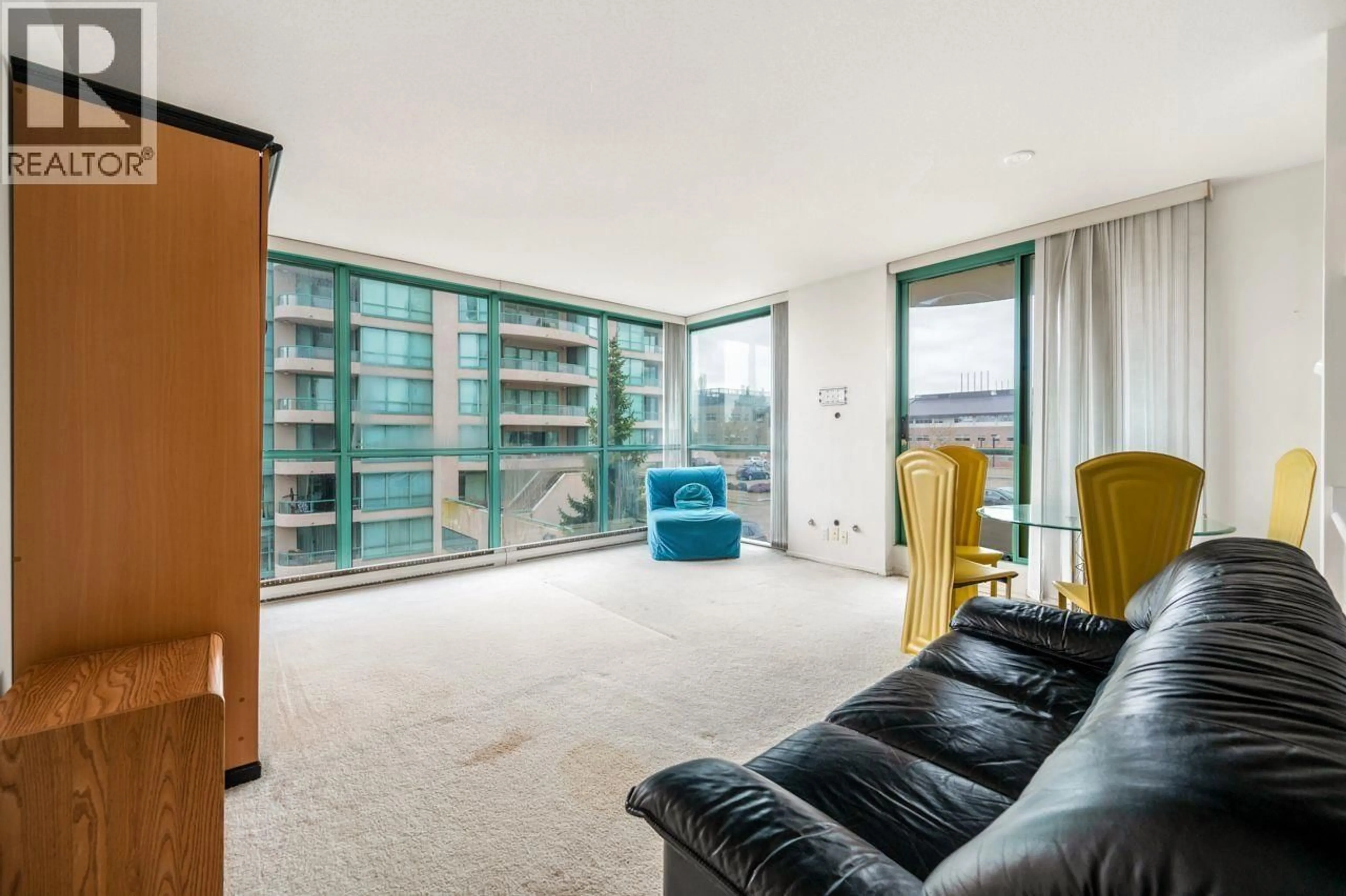 Living room with furniture, unknown for 402 - 8851 LANSDOWNE ROAD, Richmond British Columbia V6X3X7