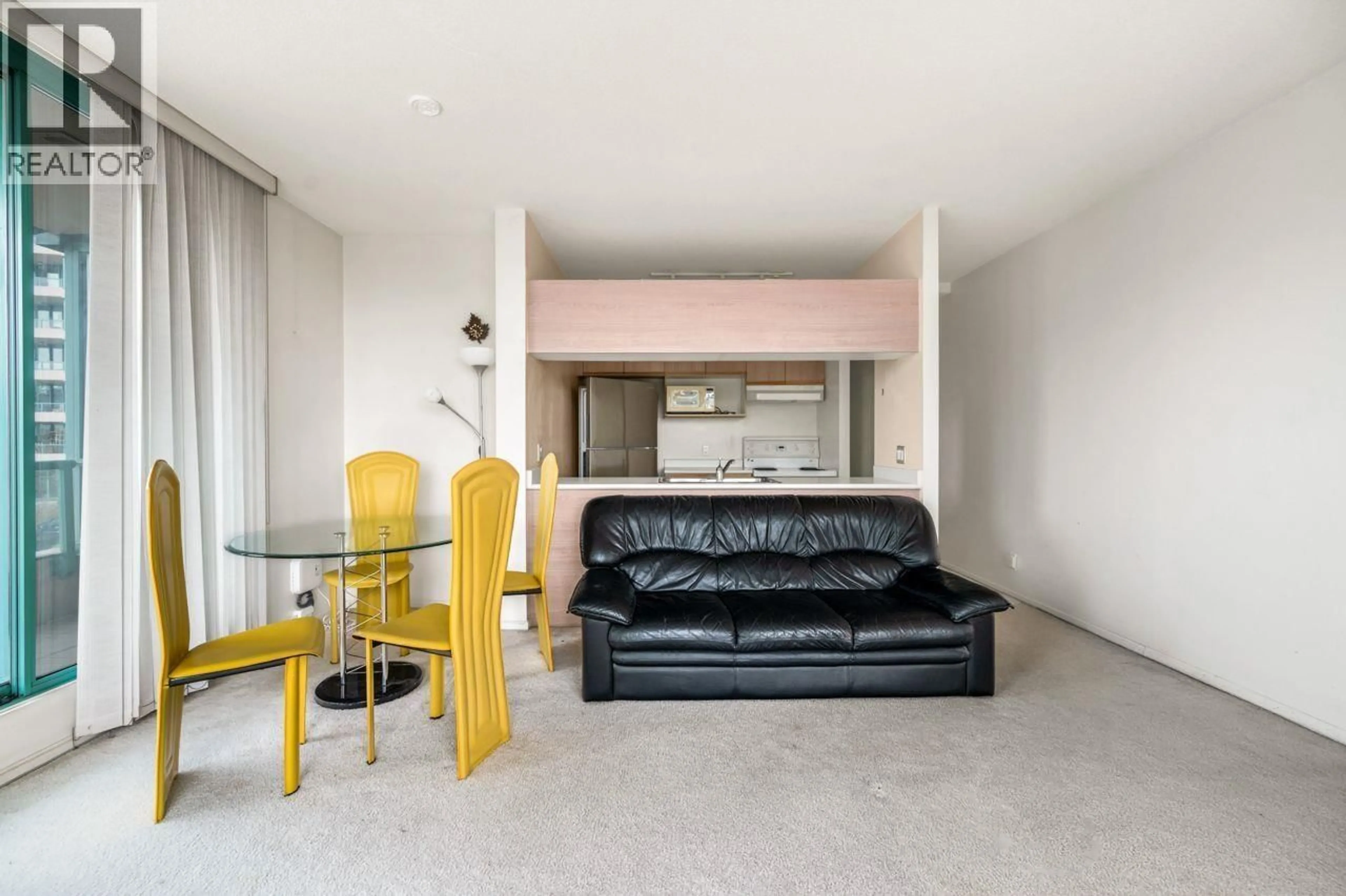 Living room with furniture, cement floor for 402 - 8851 LANSDOWNE ROAD, Richmond British Columbia V6X3X7