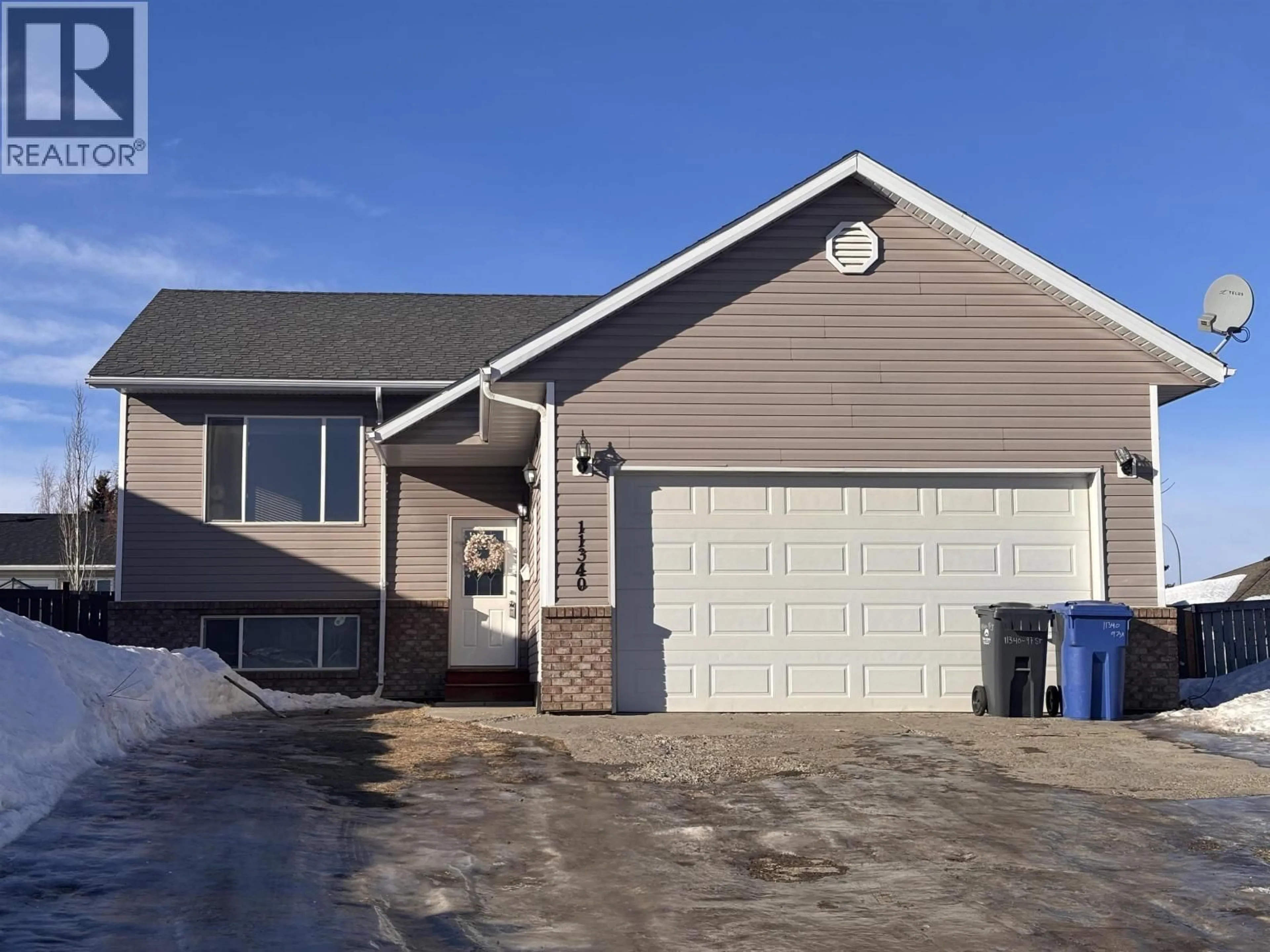 Home with vinyl exterior material, street for 11340 97 STREET, Fort St. John British Columbia V1J7H8