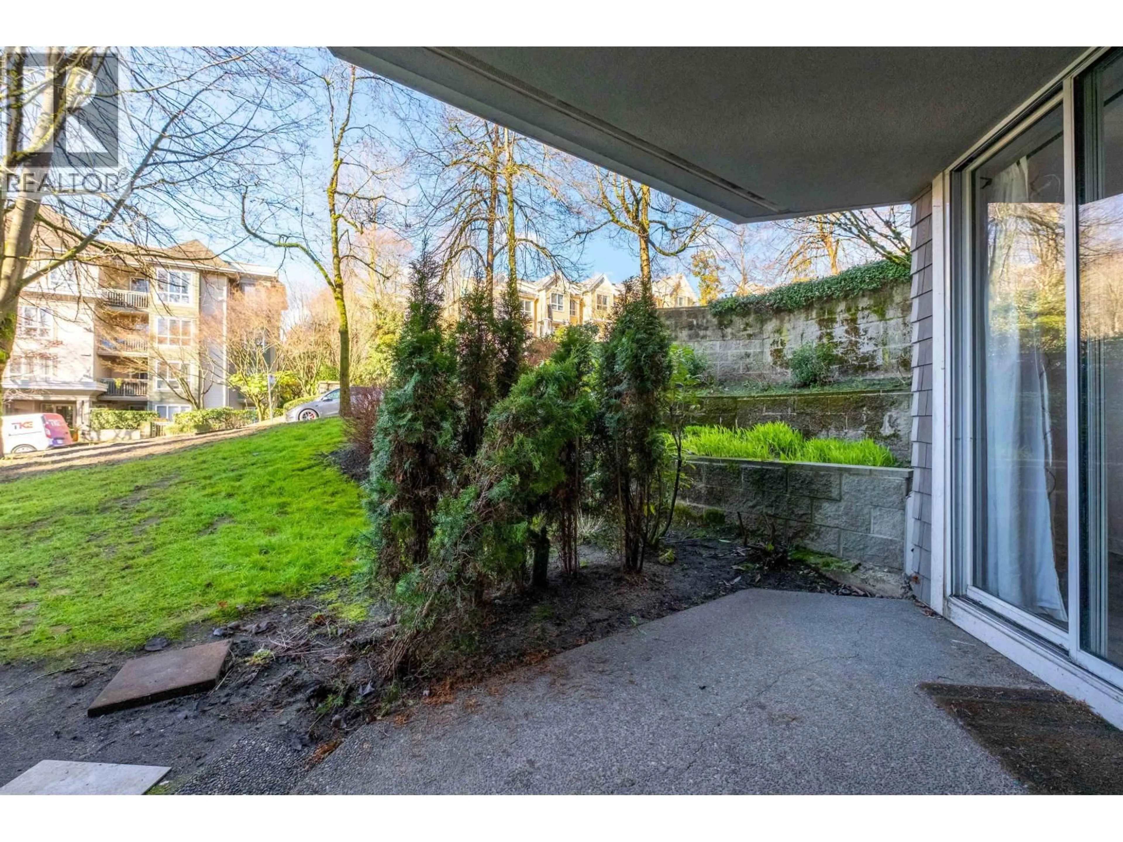 Patio, forest/trees view for 101 - 8460 JELLICOE STREET, Vancouver British Columbia V5S4S8