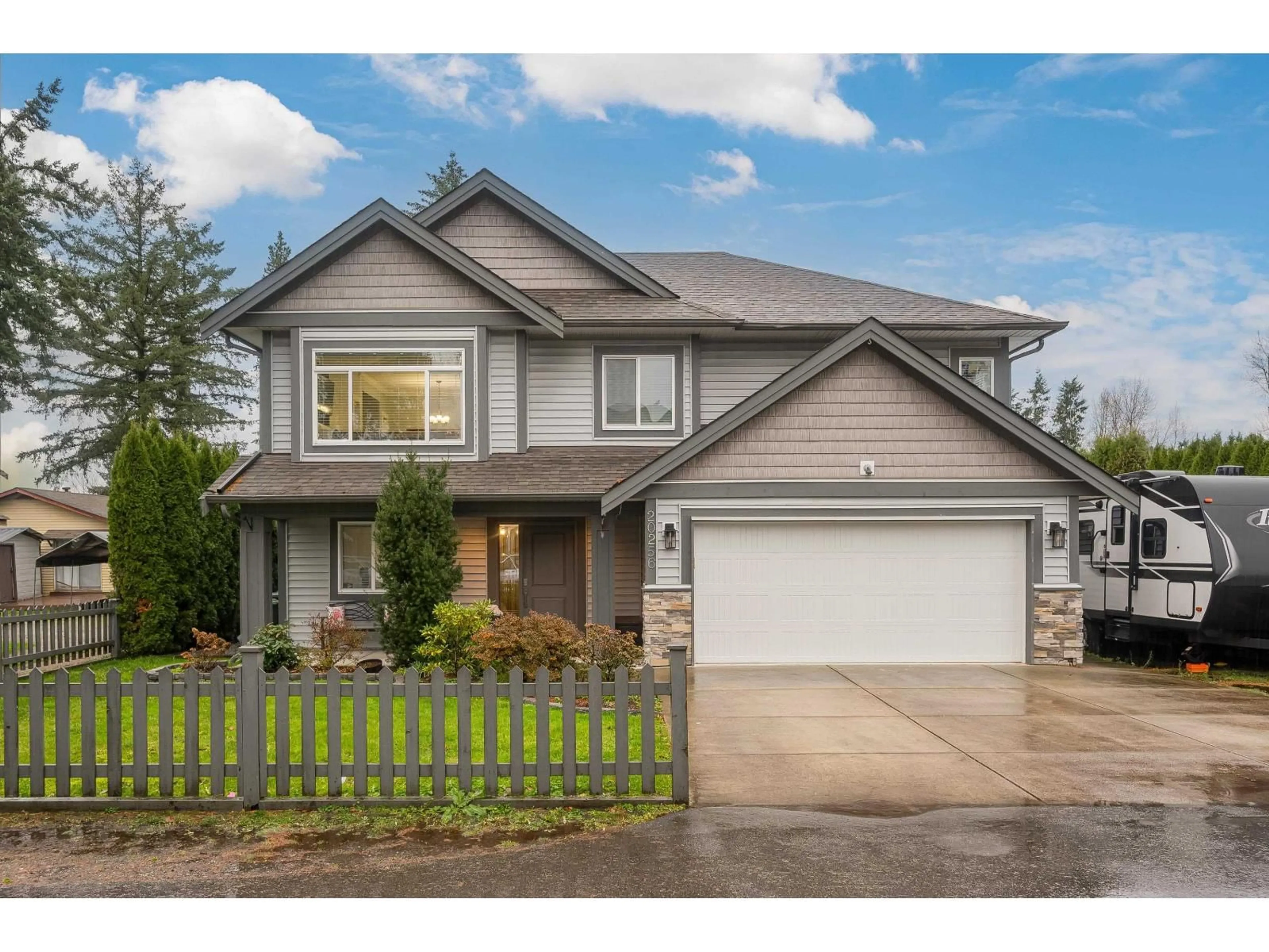 Home with vinyl exterior material, street for 2 - 20256 98A AVENUE, Langley British Columbia V1M3E3