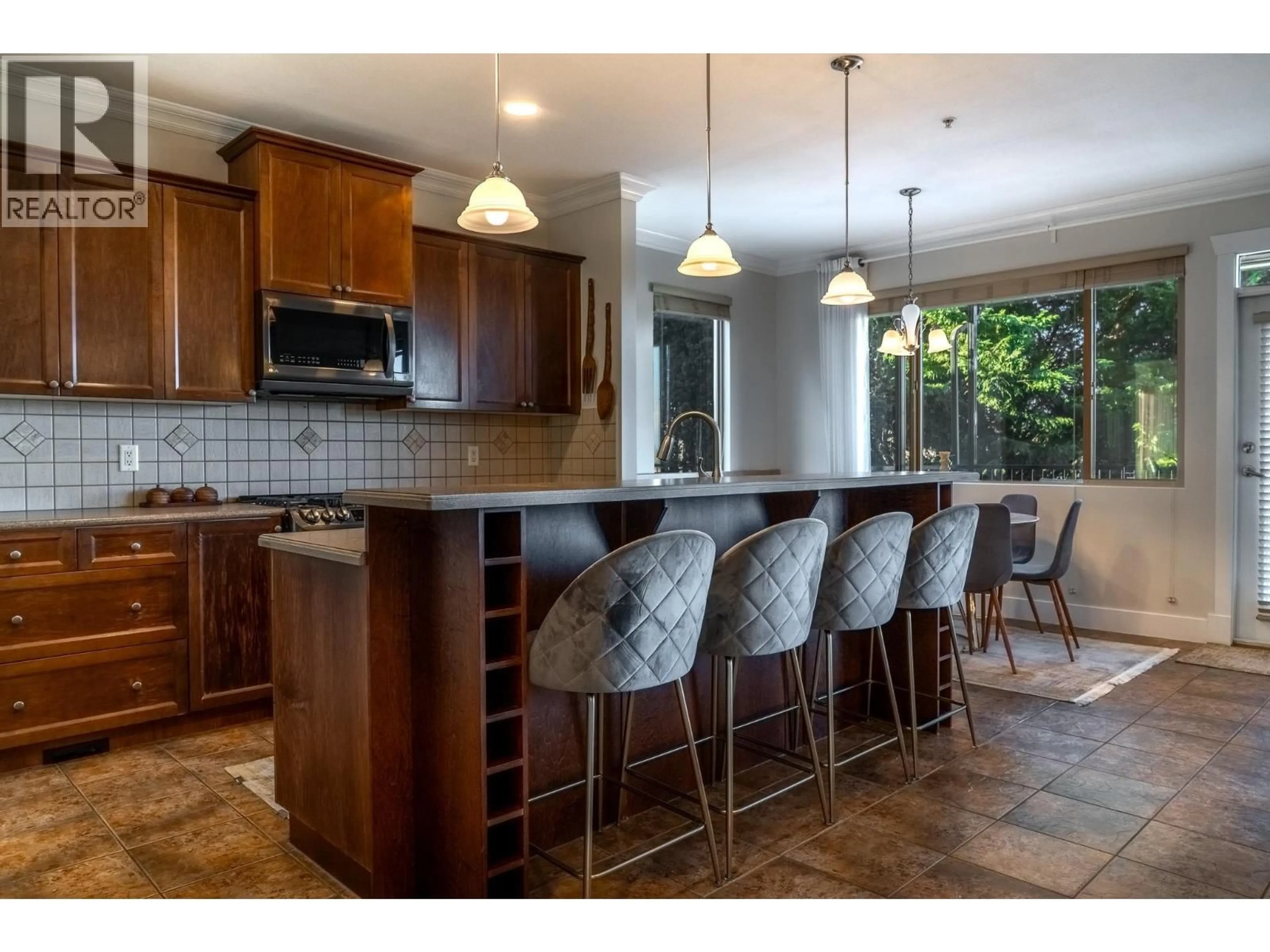 Open concept kitchen, ceramic/tile floor for 10707 248 STREET, Maple Ridge British Columbia V2W1G6