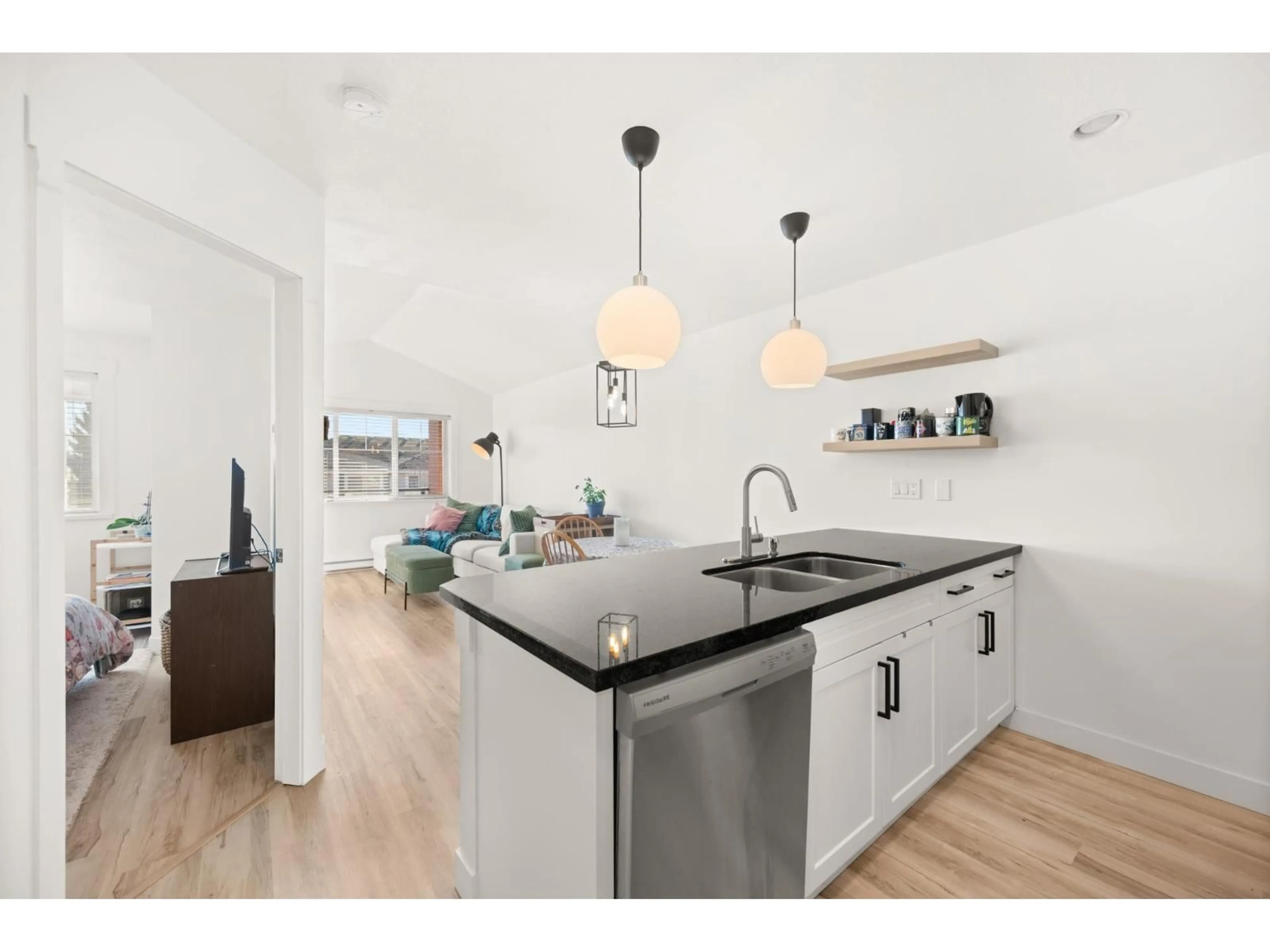 Open concept kitchen, unknown for 308 - 19774 56 AVENUE, Langley British Columbia V3A3X6