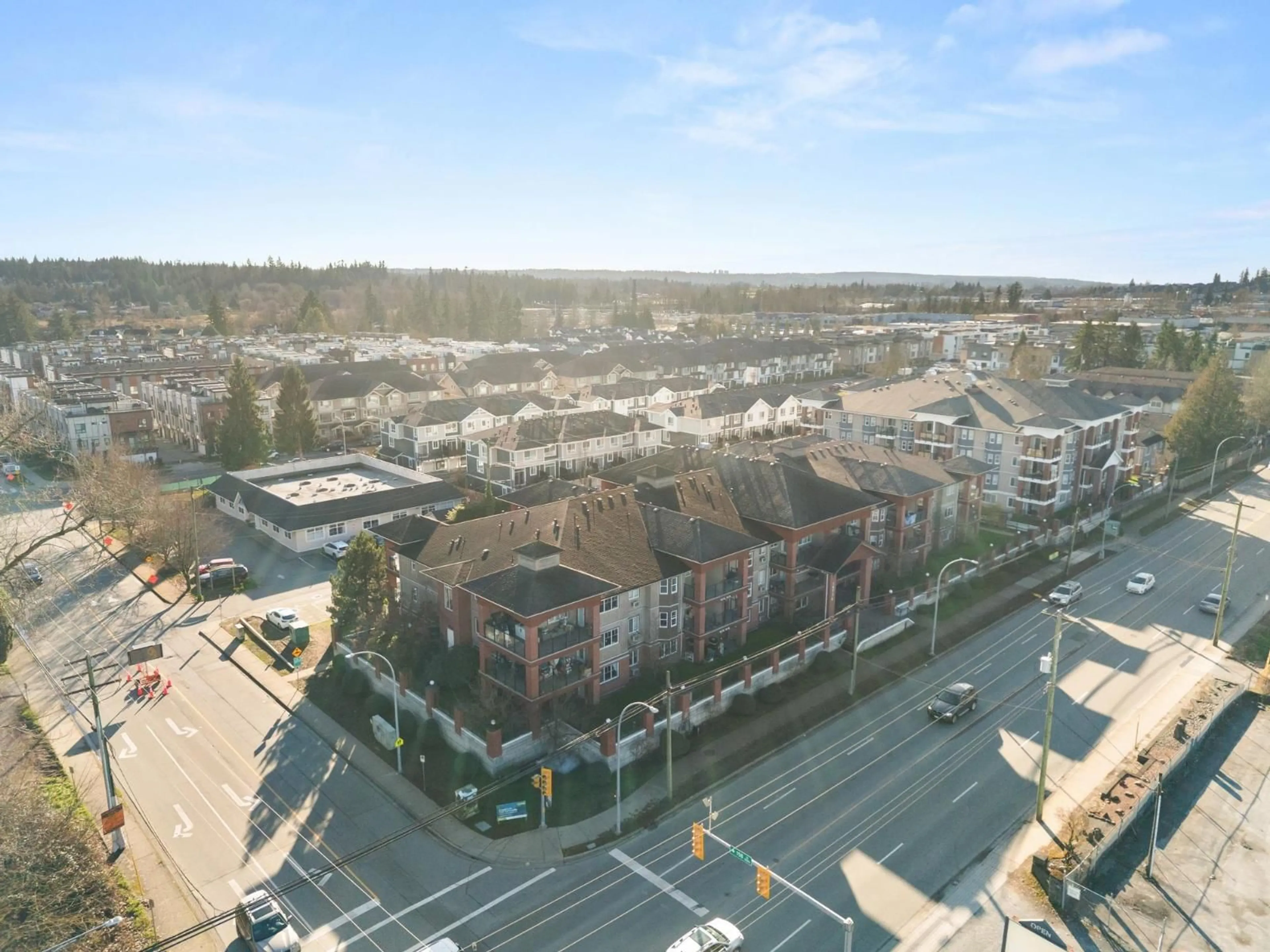A pic from outside/outdoor area/front of a property/back of a property/a pic from drone, city buildings view from balcony for 308 - 19774 56 AVENUE, Langley British Columbia V3A3X6