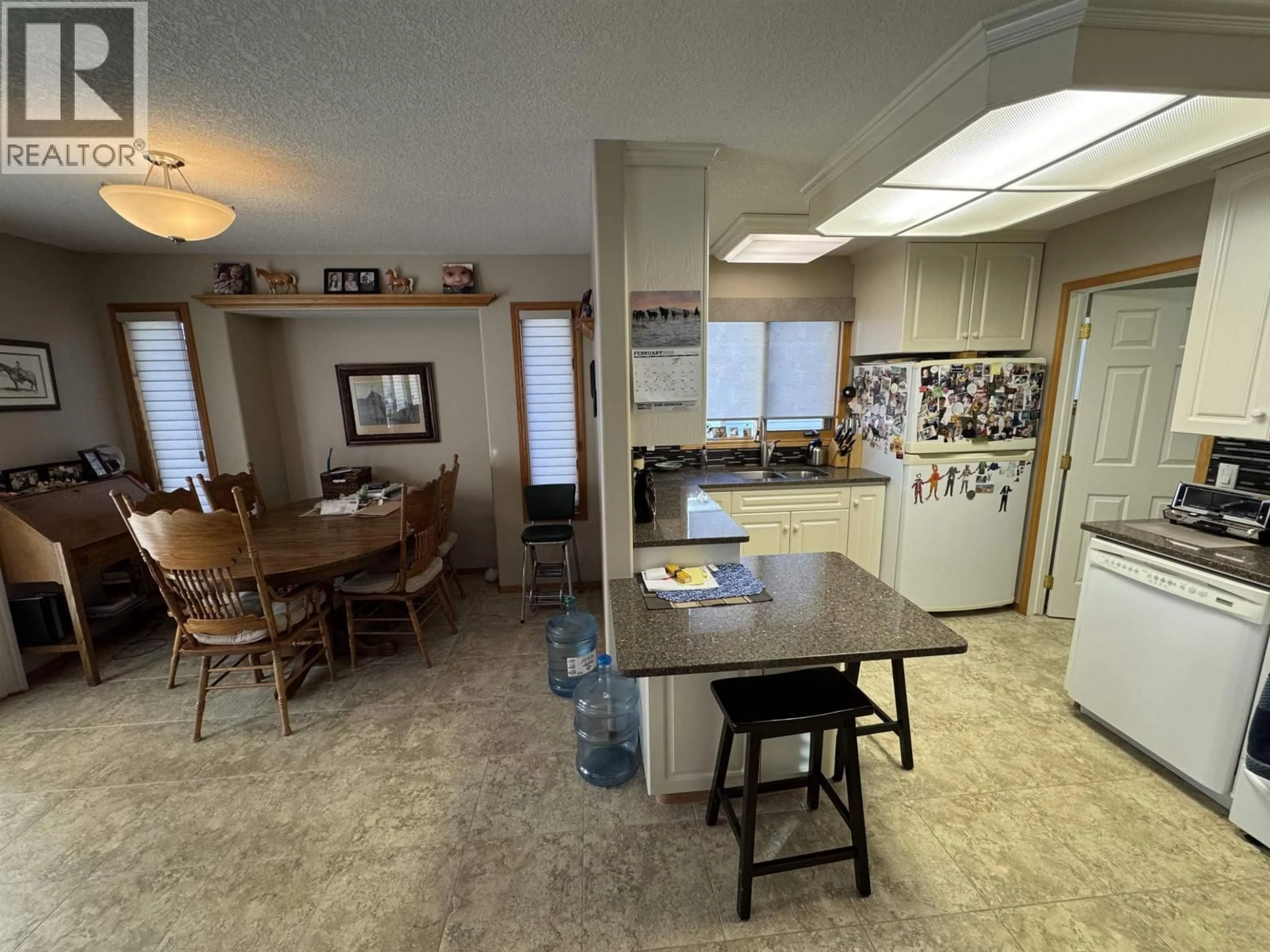 Open concept kitchen, ceramic/tile floor for 9111 112 AVENUE, Fort St. John British Columbia V1J6G2