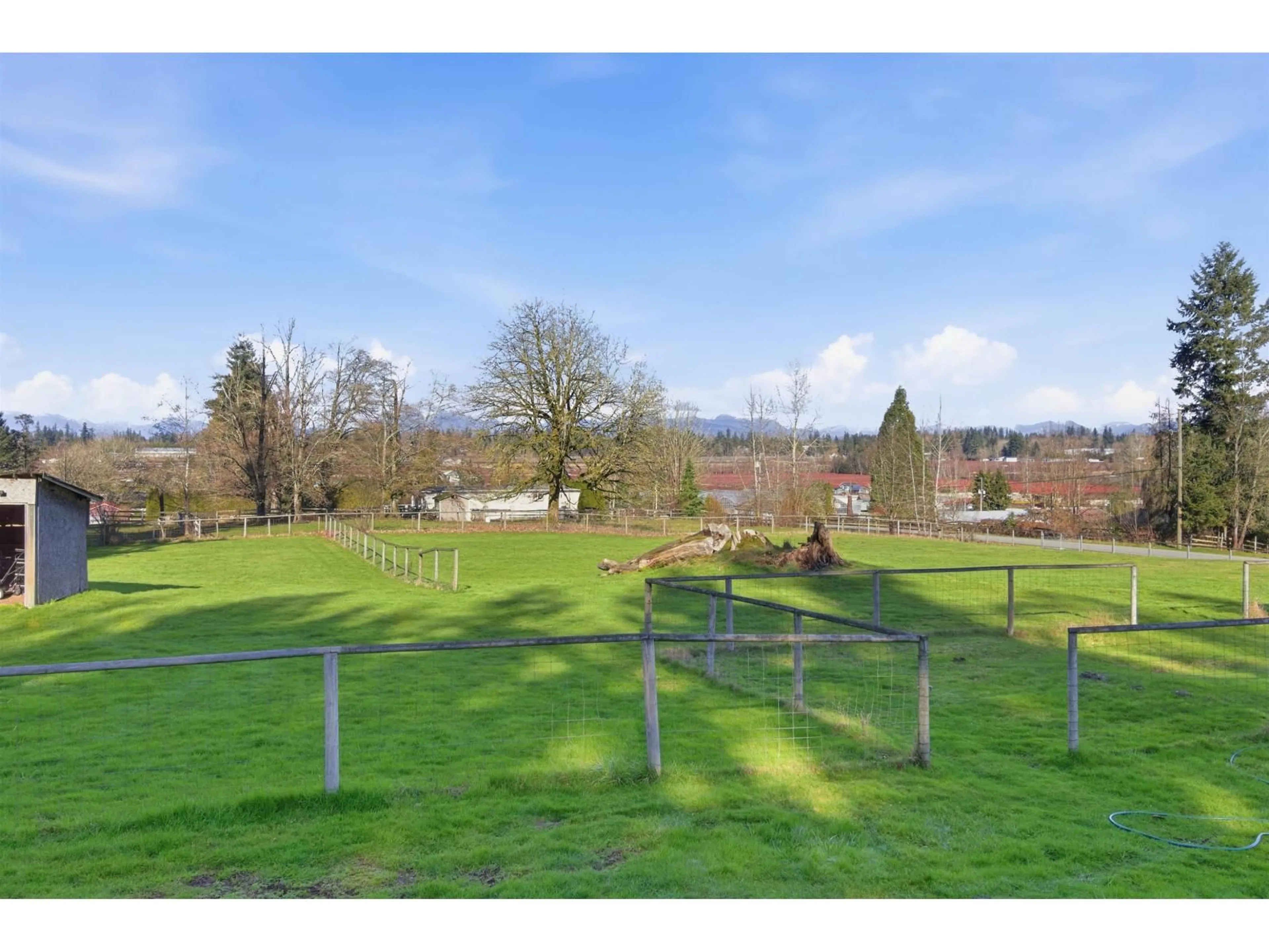 A pic from outside/outdoor area/front of a property/back of a property/a pic from drone, mountain view for 1405 227 STREET, Langley British Columbia V2Z1K6