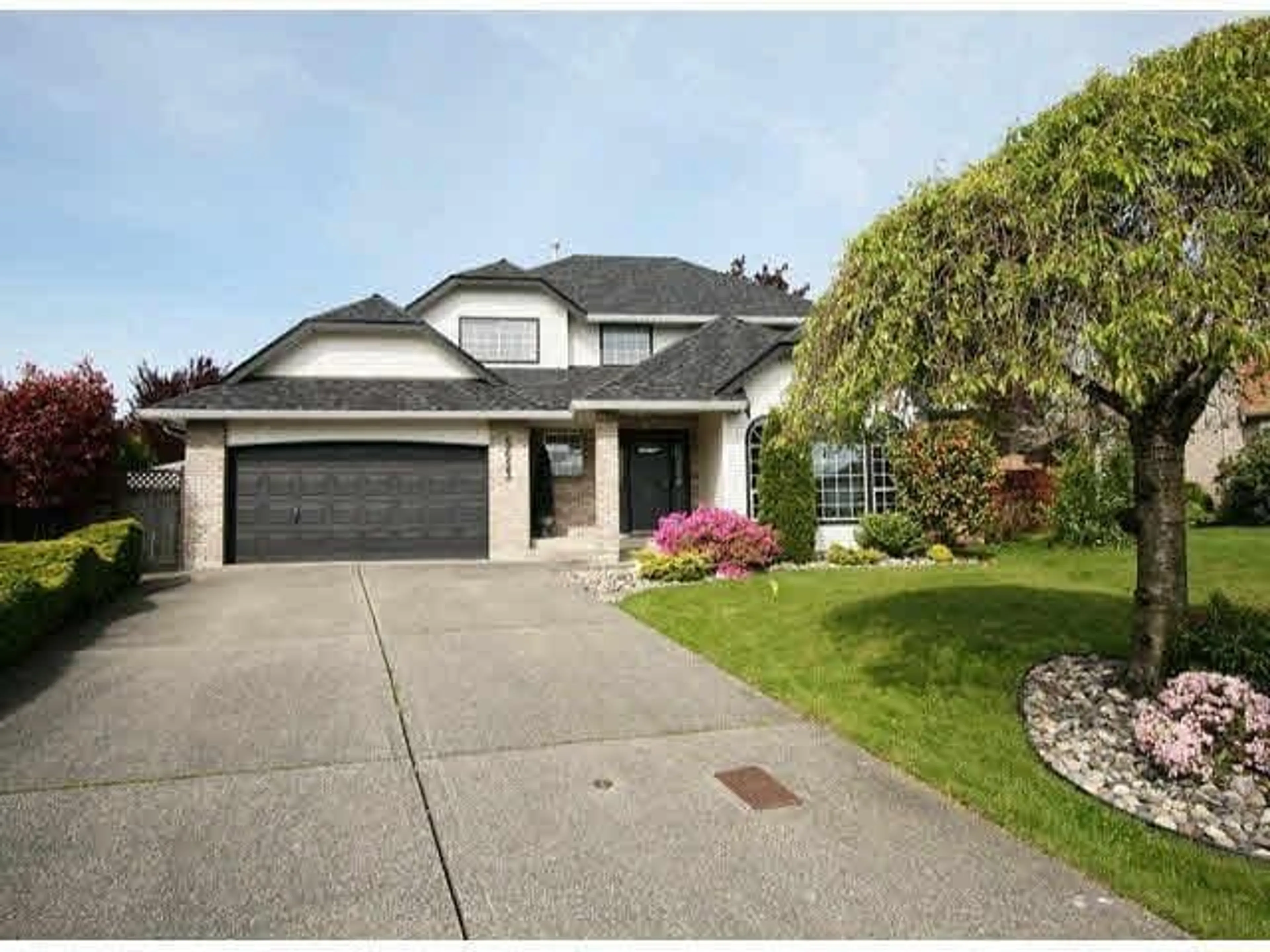 Home with vinyl exterior material, street for 5653 187 STREET, Surrey British Columbia V3S7N3