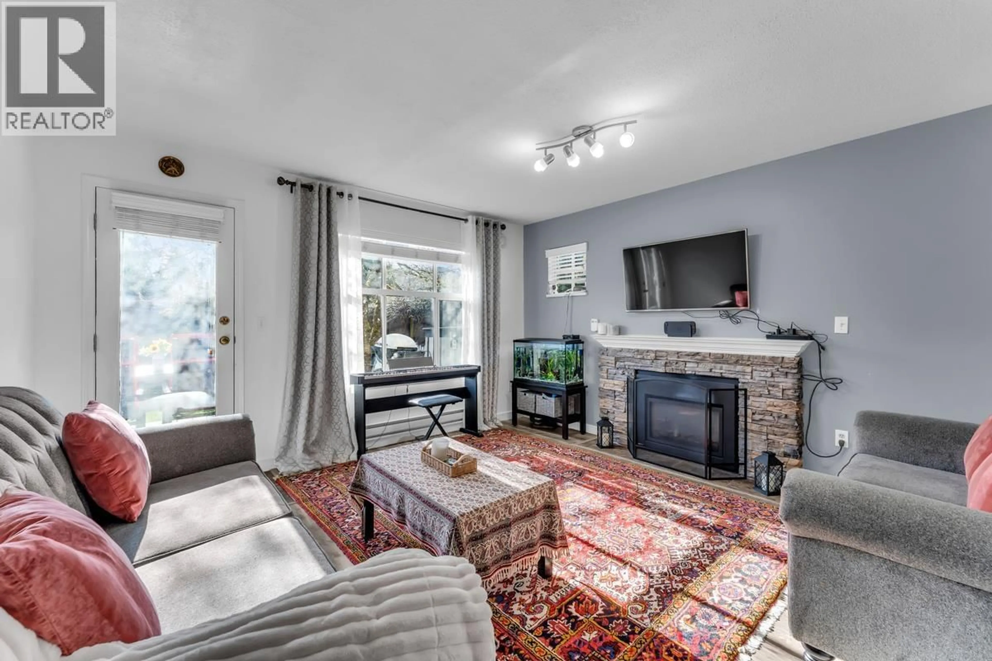 Living room with furniture, unknown for 87 - 12099 237 STREET, Maple Ridge British Columbia V4R2C3