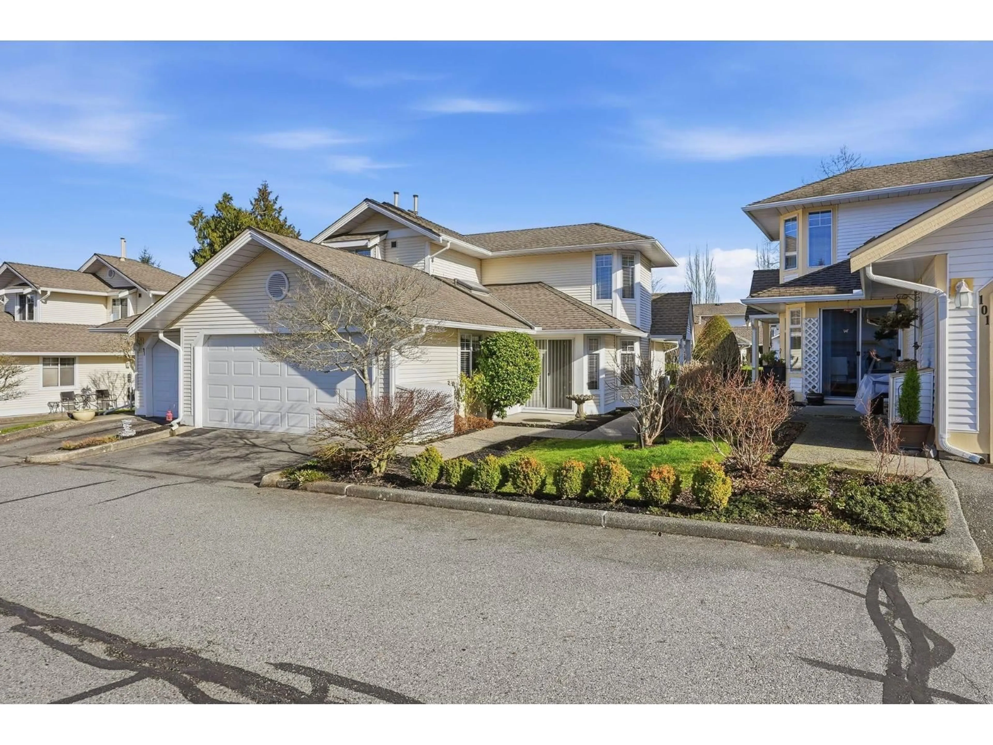 A pic from outside/outdoor area/front of a property/back of a property/a pic from drone, street for 100 - 8737 212 STREET, Langley British Columbia V1M2C8
