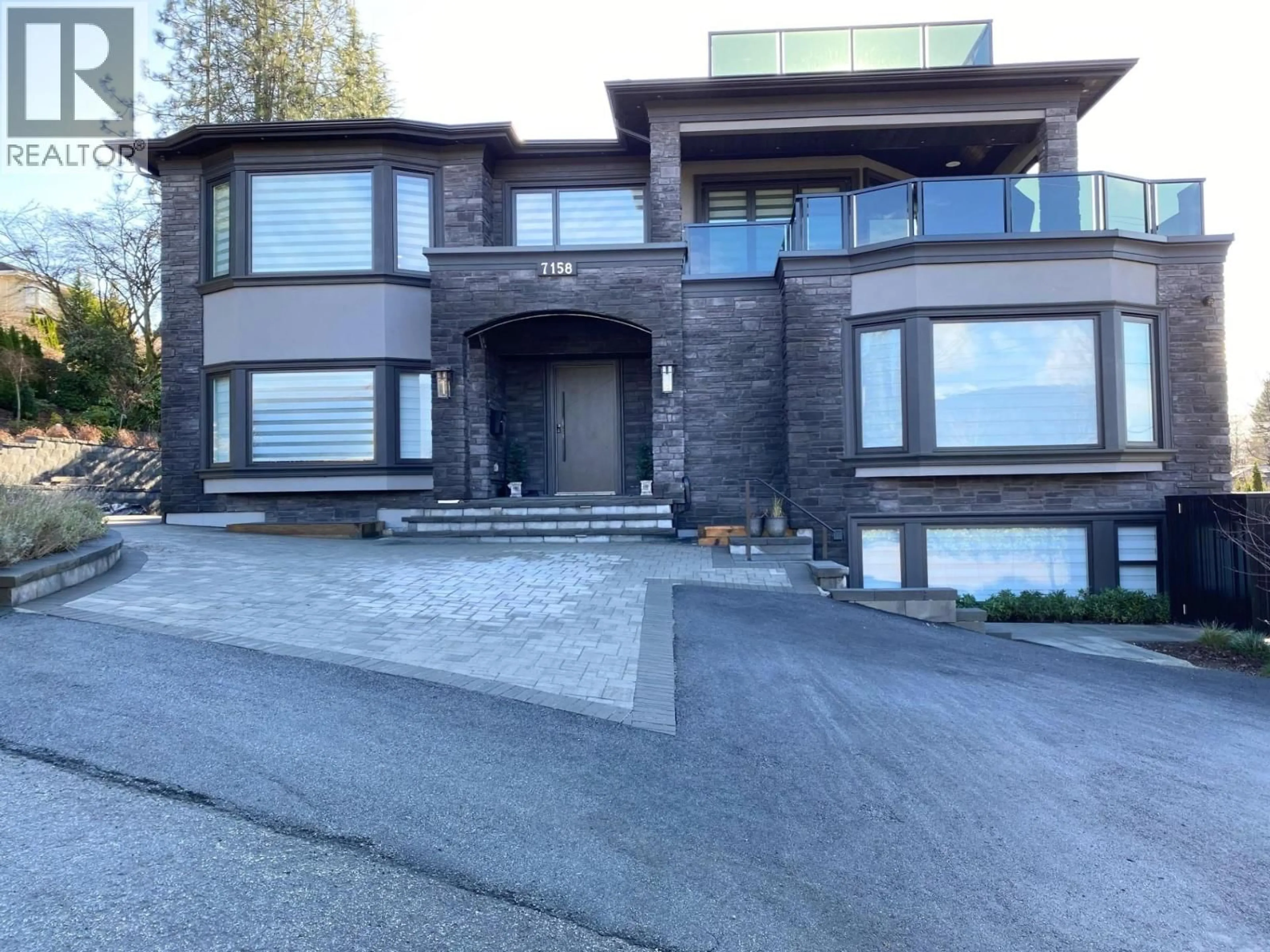 Home with brick exterior material, street for 7158 BAYVIEW DRIVE, Burnaby British Columbia V5A4T3