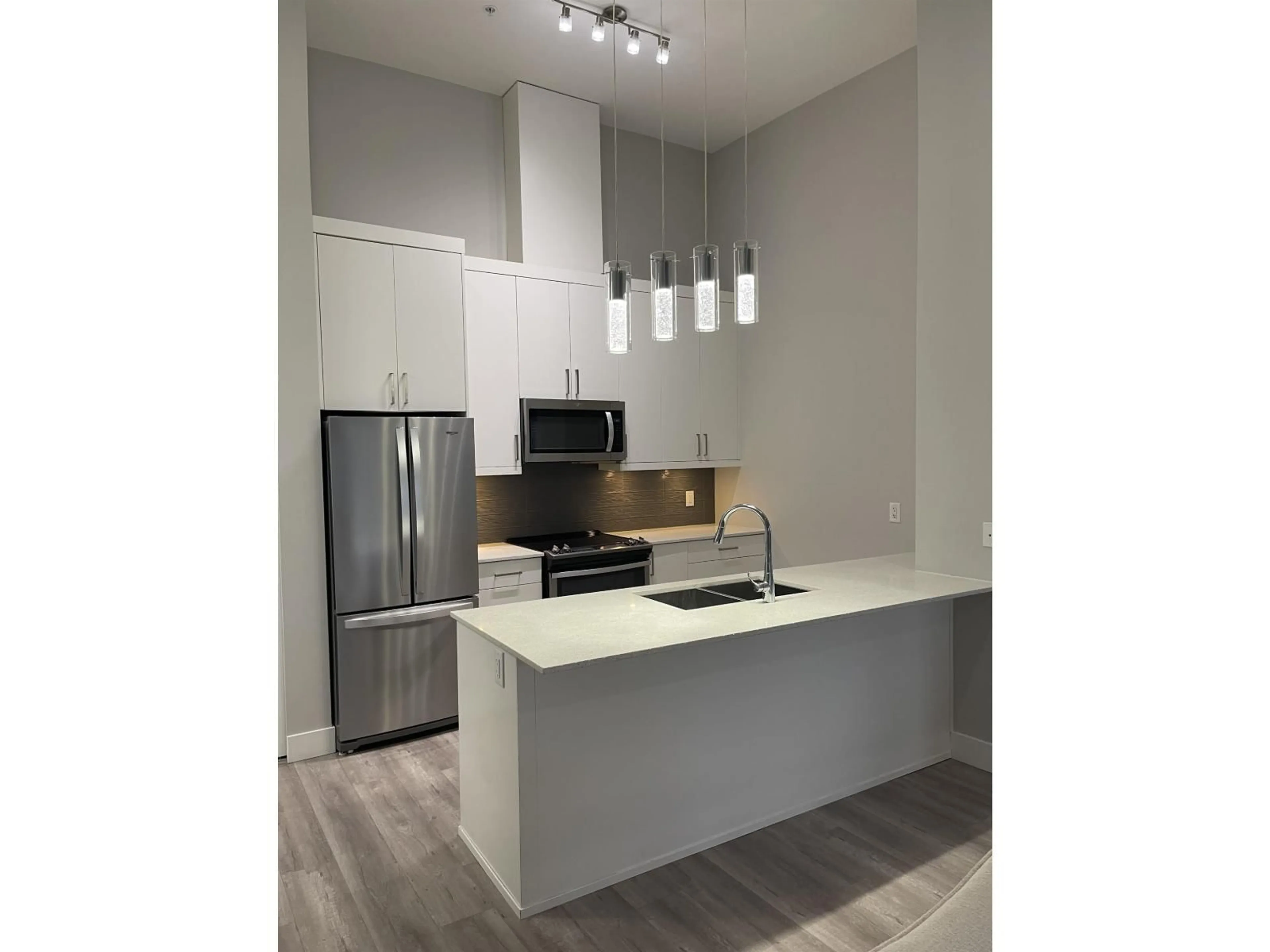 Open concept kitchen, unknown for 605 - 9015 120 STREET, Delta British Columbia V4C0E3