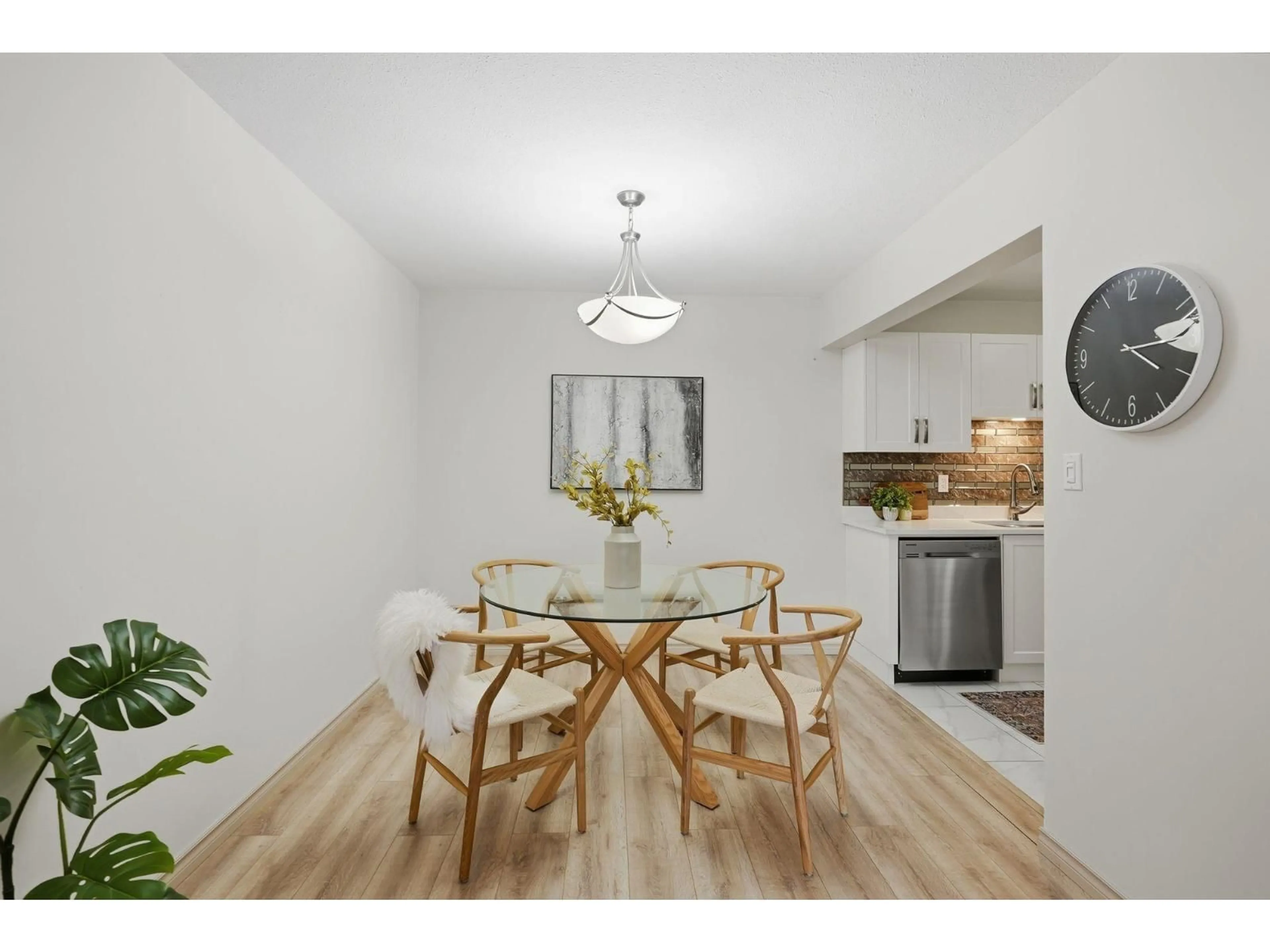 Dining room, wood/laminate floor for 311 - 2414 CHURCH STREET, Abbotsford British Columbia V2T3J7